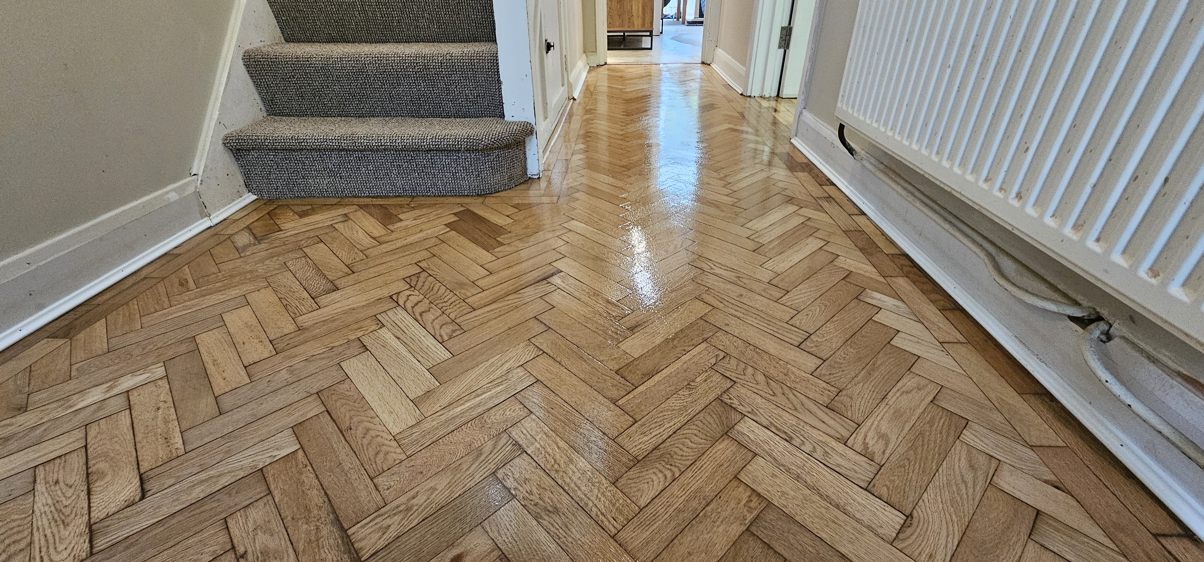 Parquet floor after sanding work in WD25