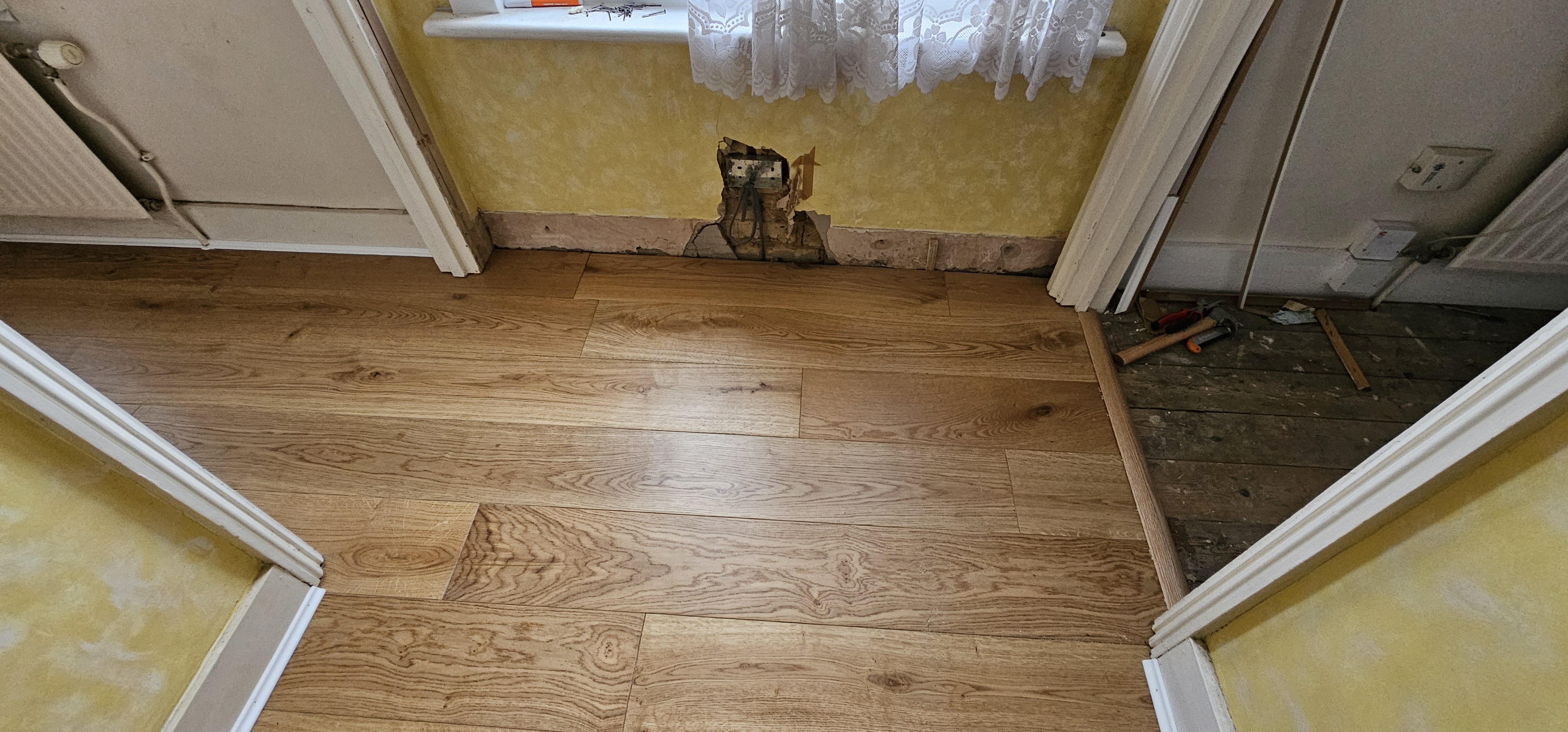 Engineered Wood floor after fitting work in N22