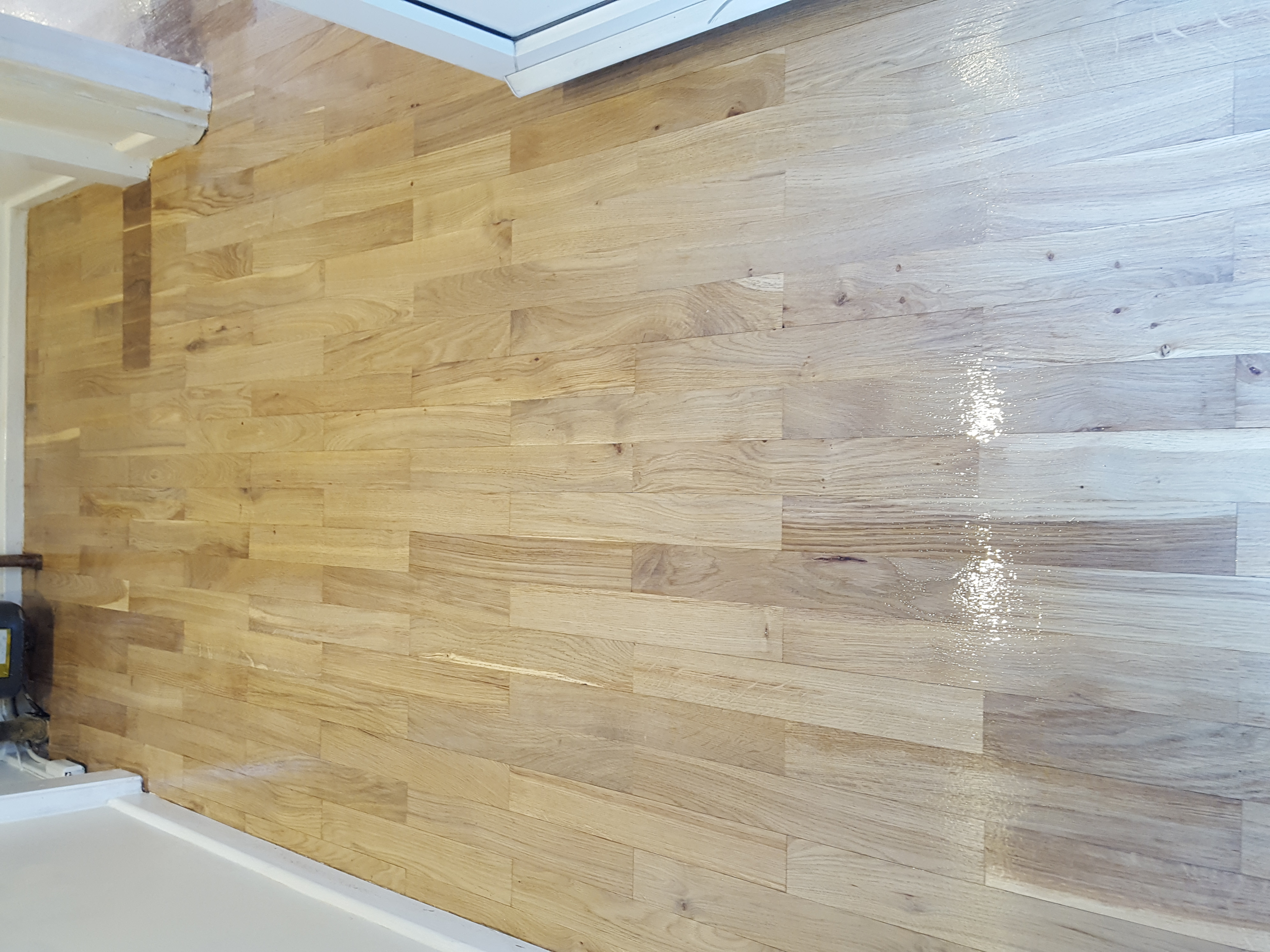 Hardwood floor after sanding work in CR0