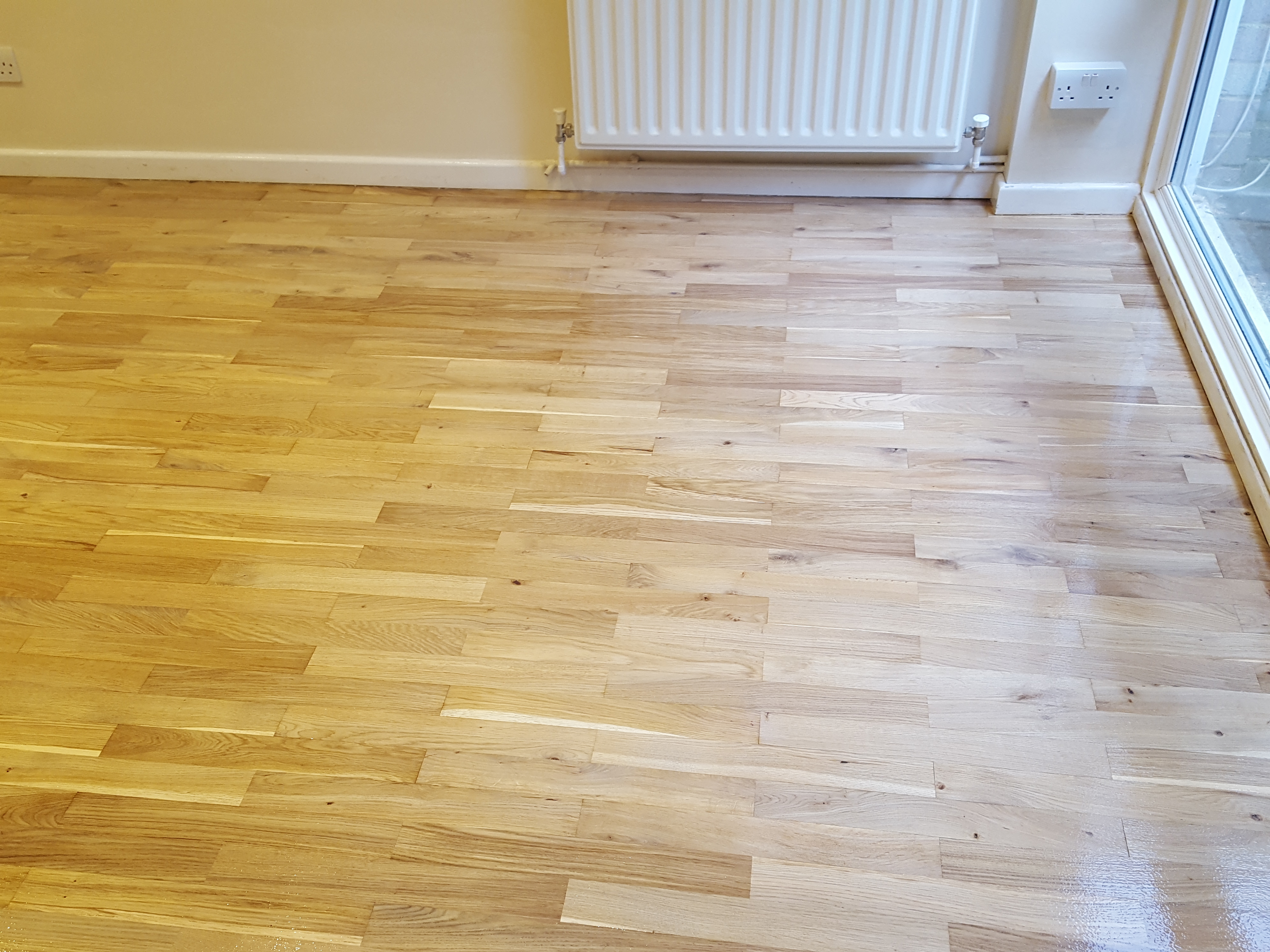 Hardwood floor after sanding work in CR0