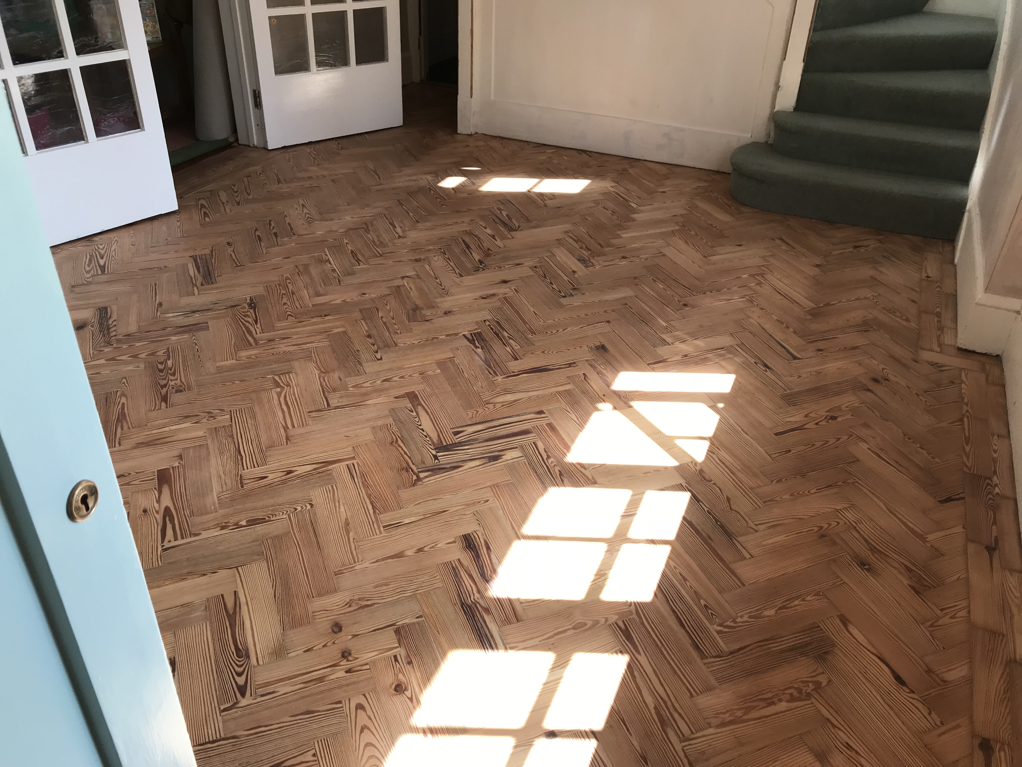 Parquet floor after sanding work in CR8