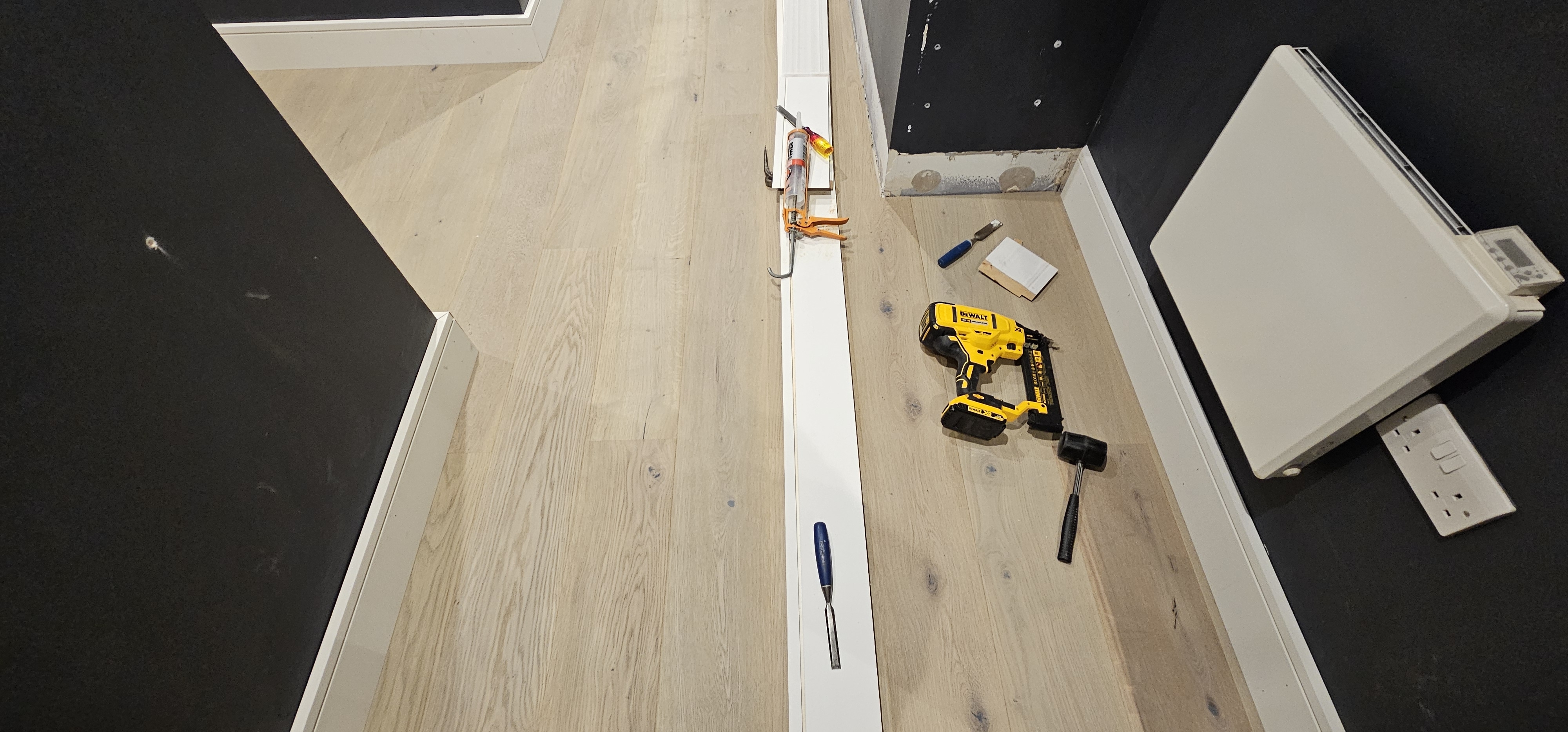 Engineered Wood floor after fitting work in E1