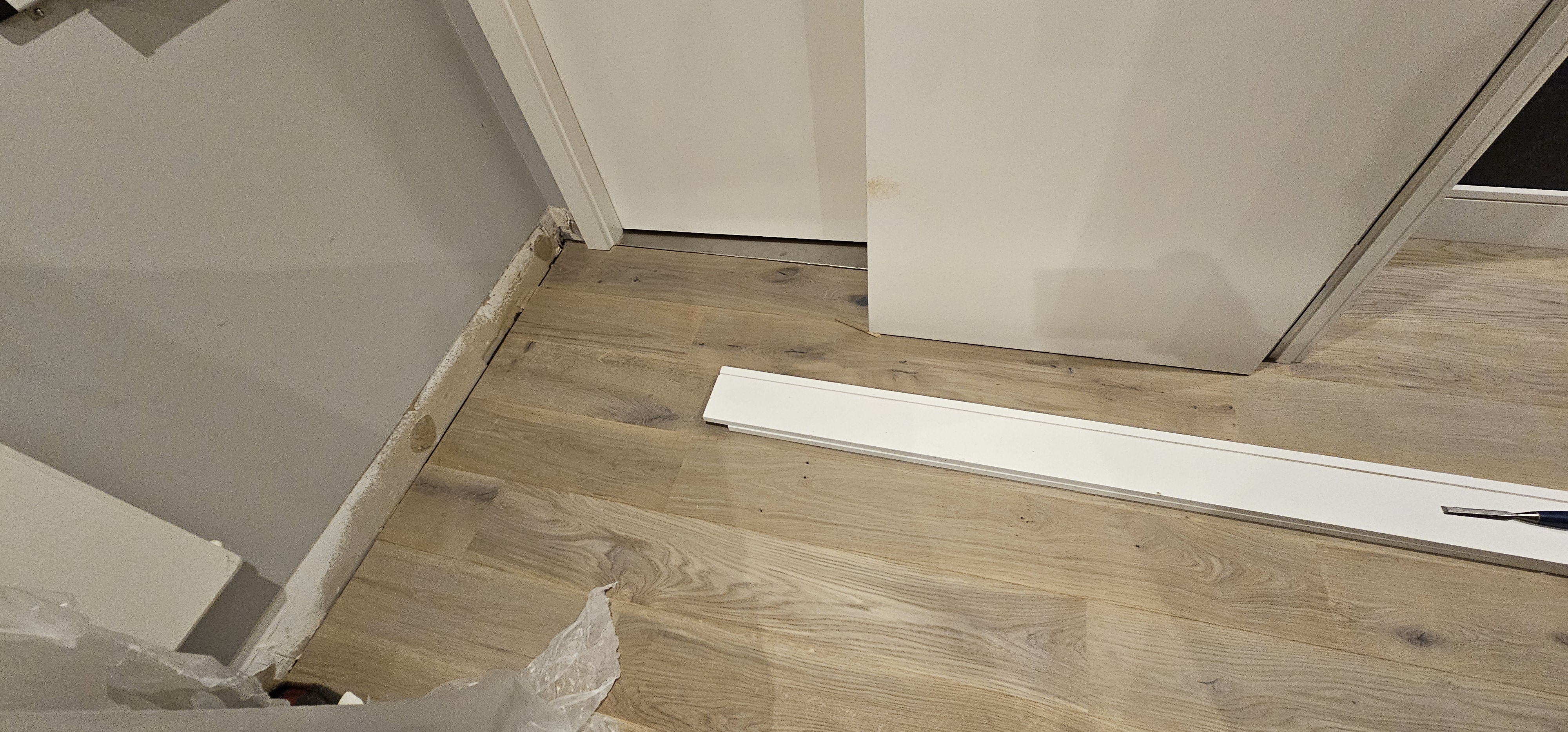 Engineered Wood floor after fitting work in E1