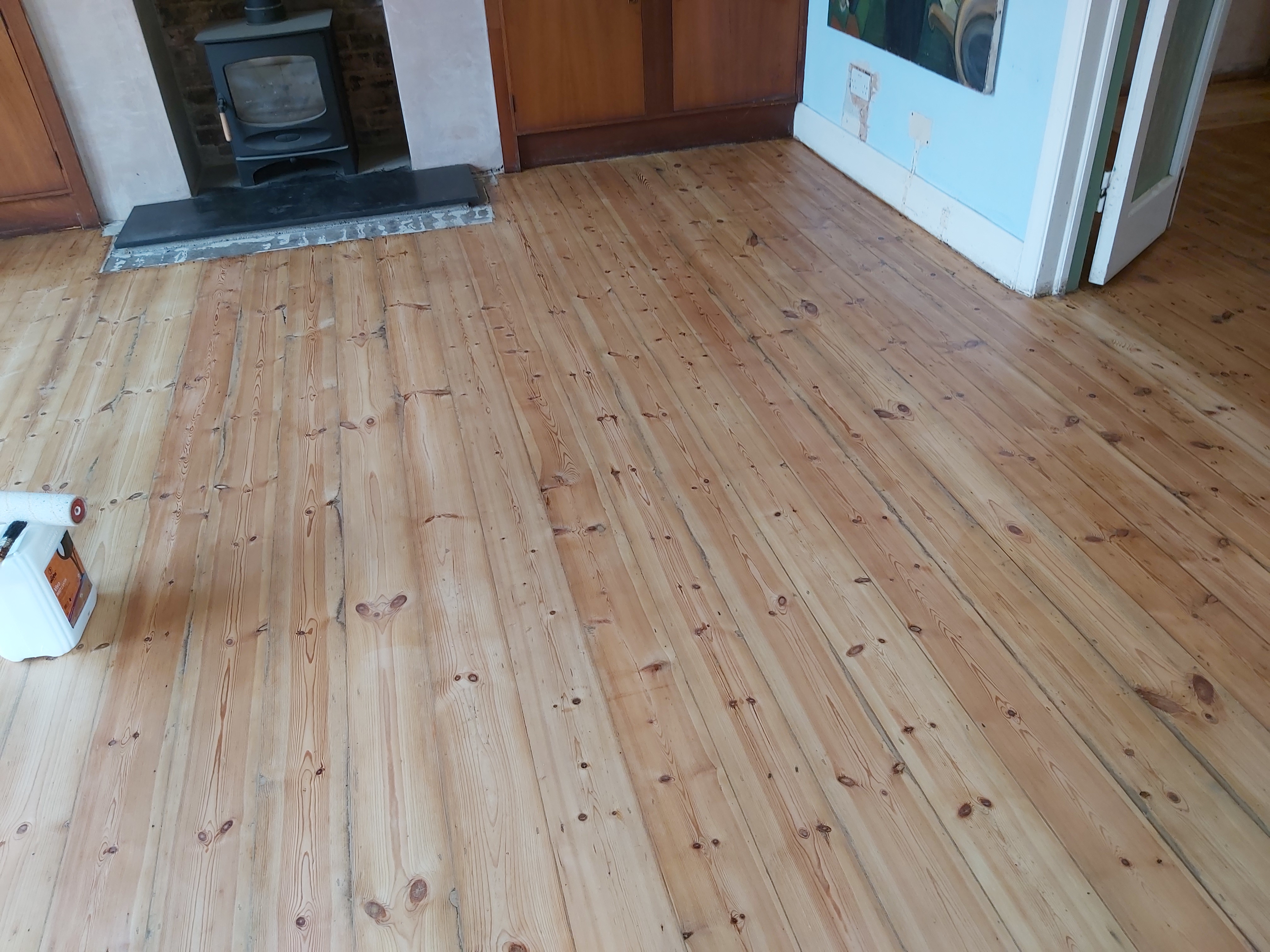 Hardwood floor after sanding work in E11