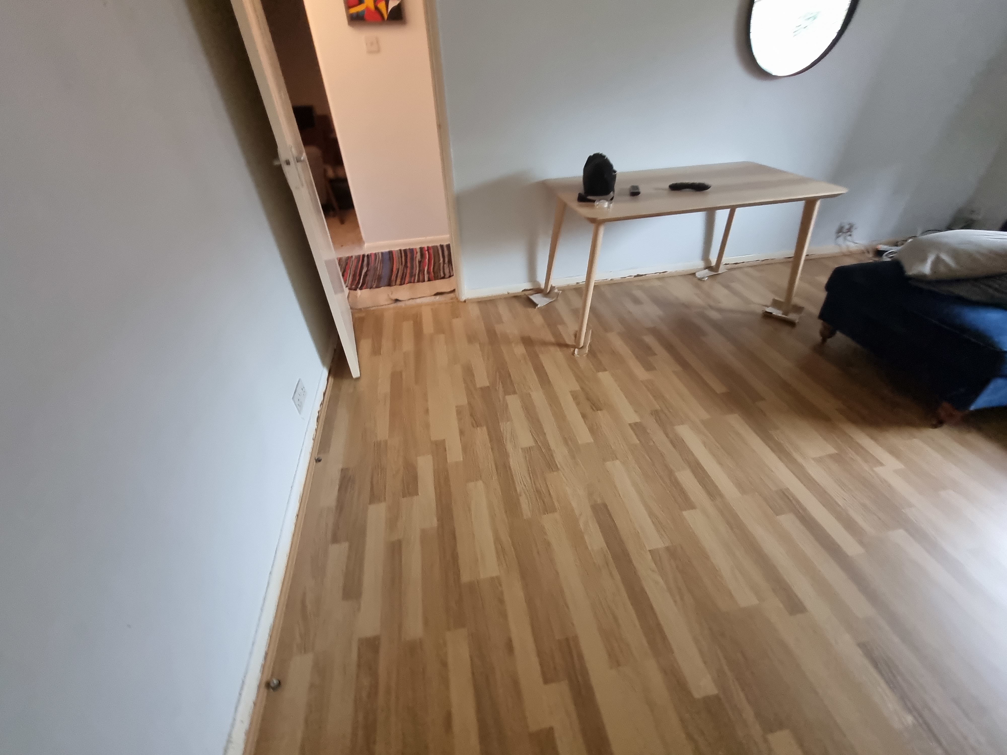 Laminate floor after fitting work in E17