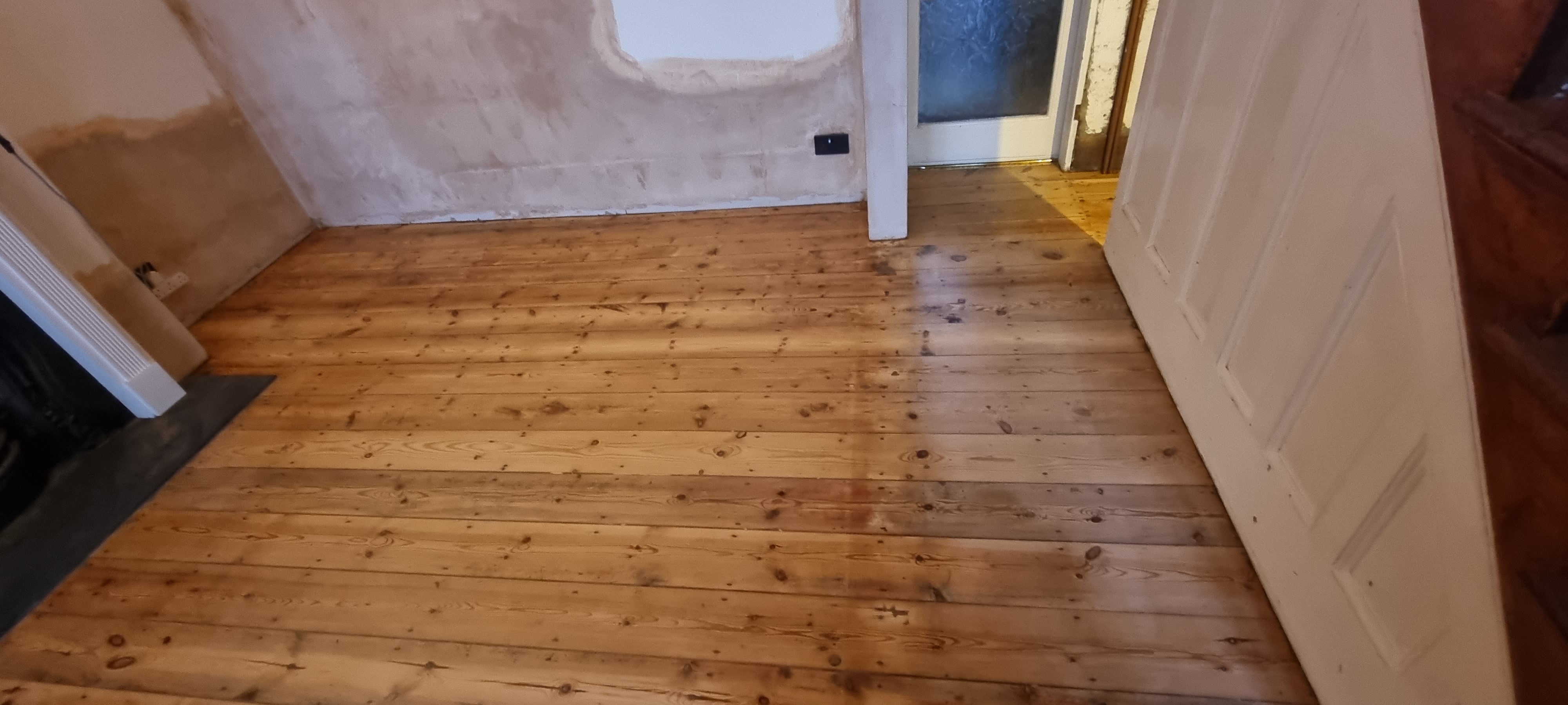 Floorboards floor after sanding work in E17