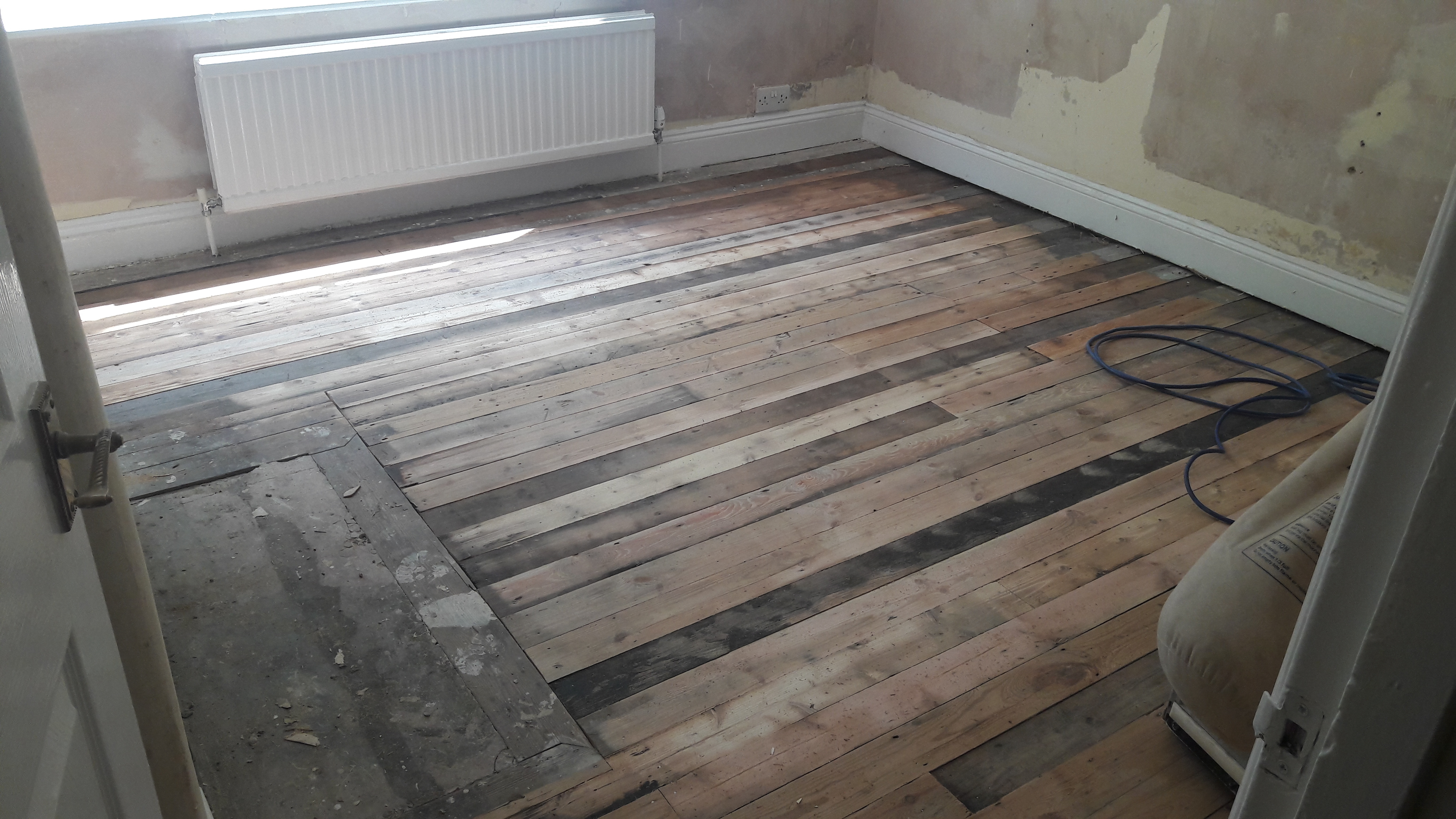 Floorboards floor after sanding work in E17