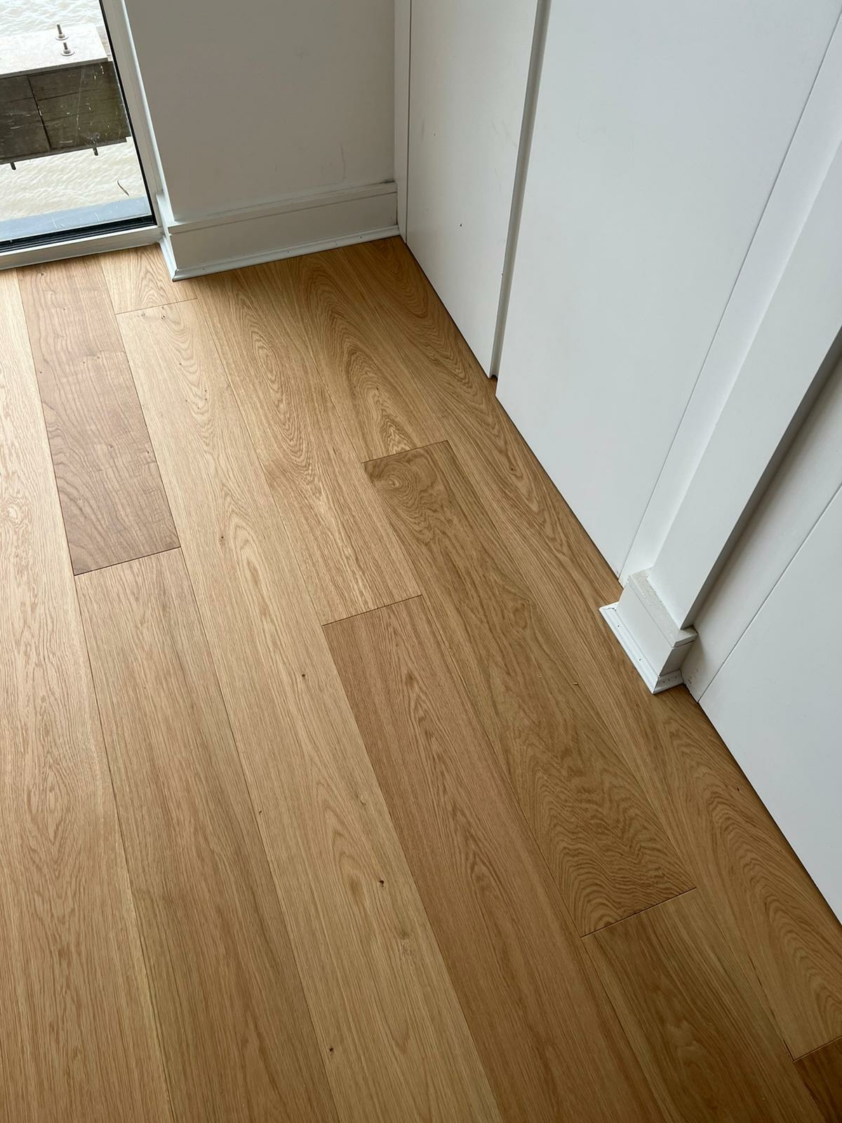 Engineered Wood floor after fitting work in E1W