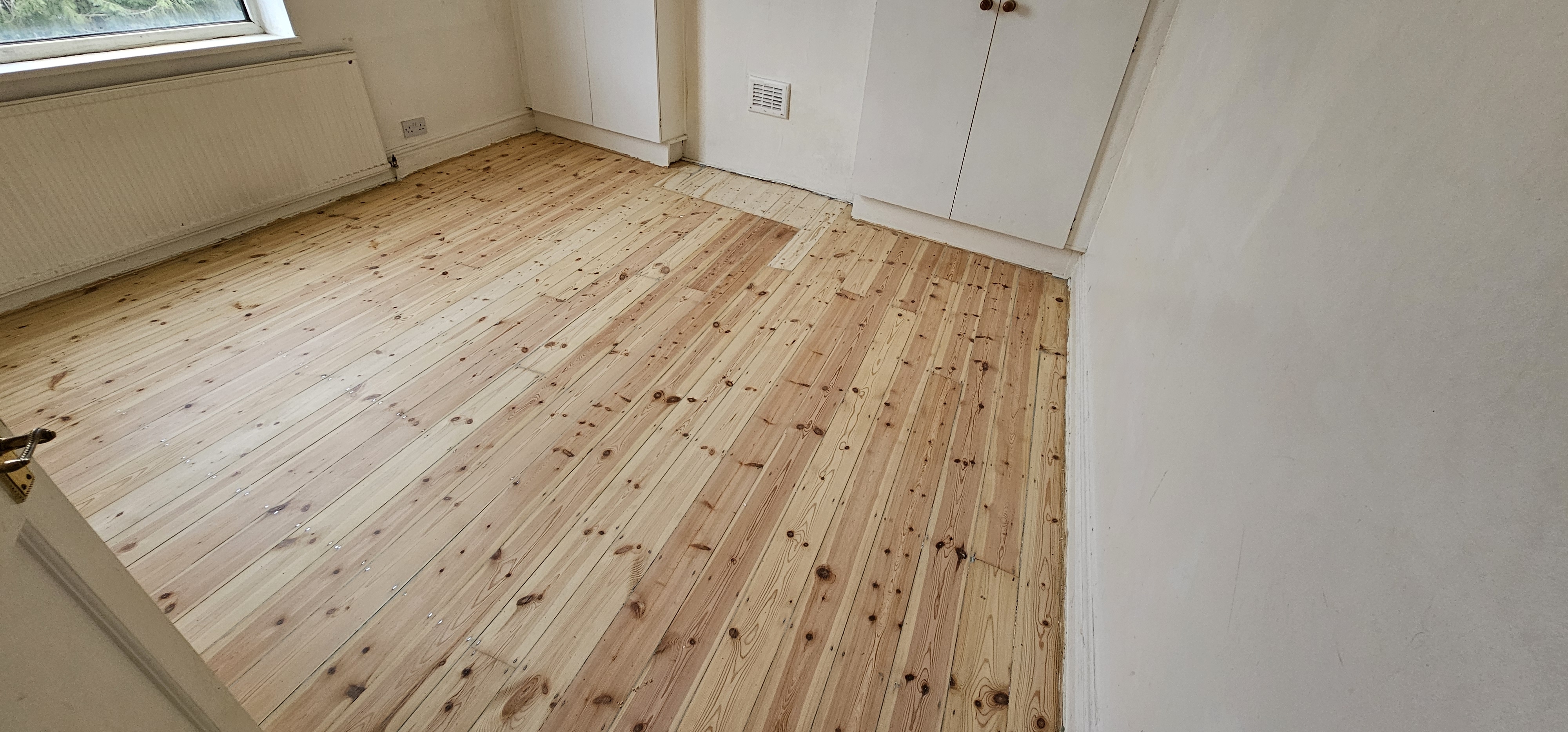 Floorboards floor after sanding work in E4