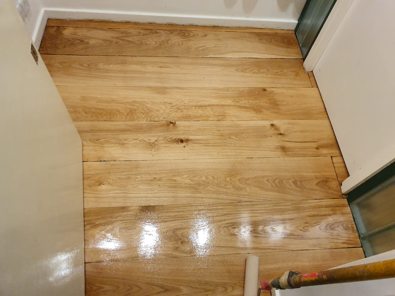 Hardwood floor after sanding work in E8