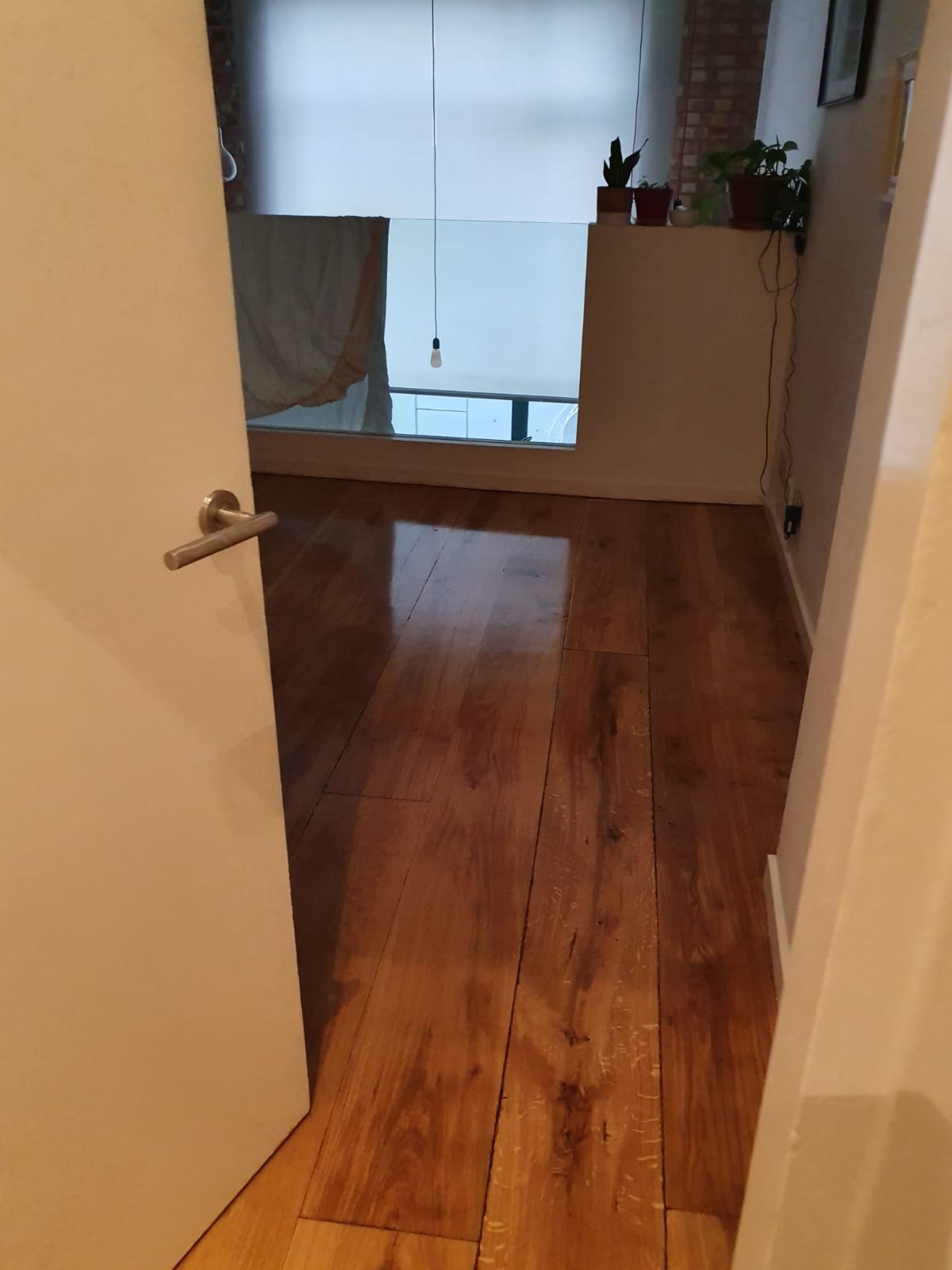 Hardwood floor after sanding work in E8
