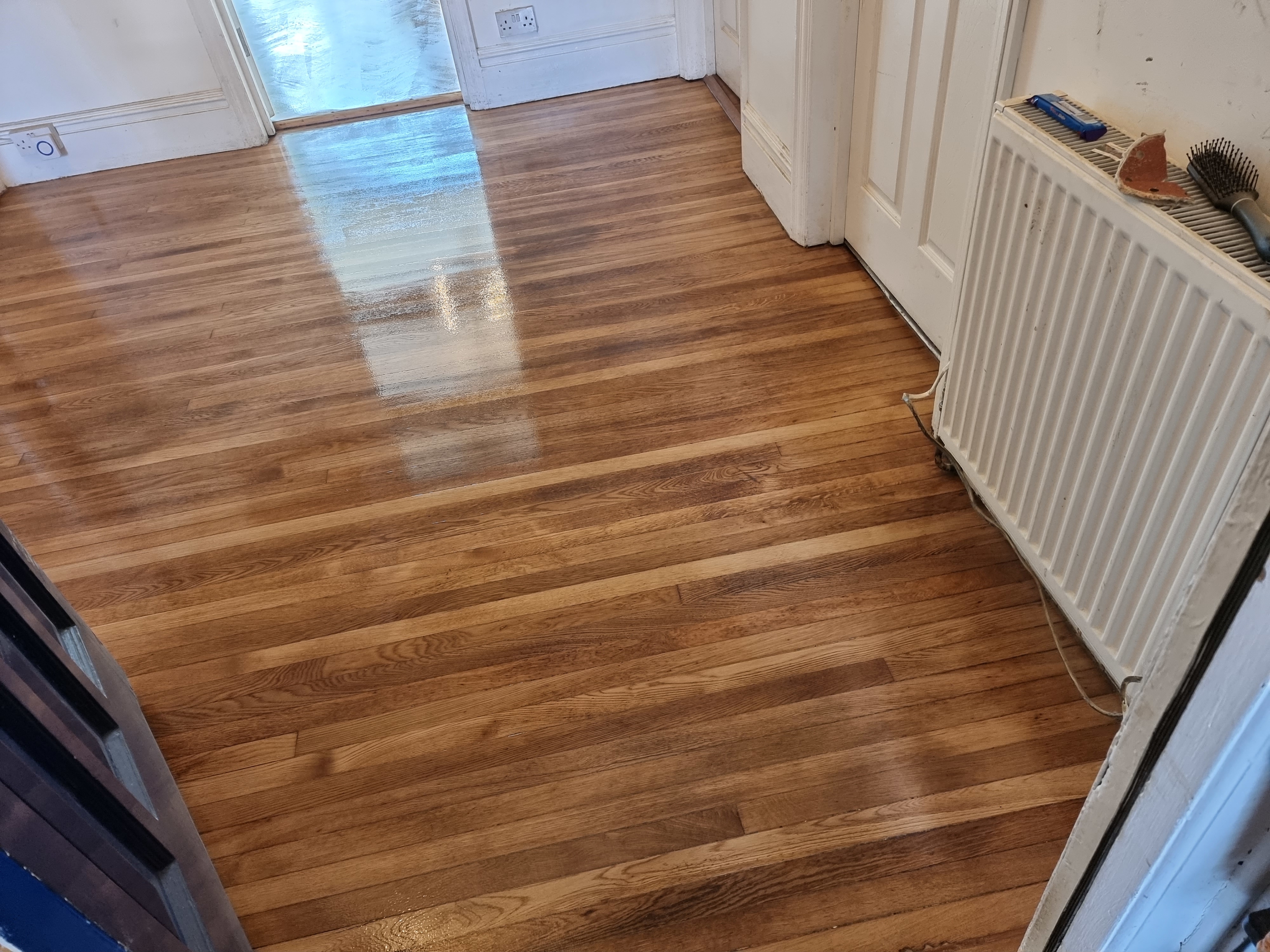 Hardwood floor after sanding work in HA0