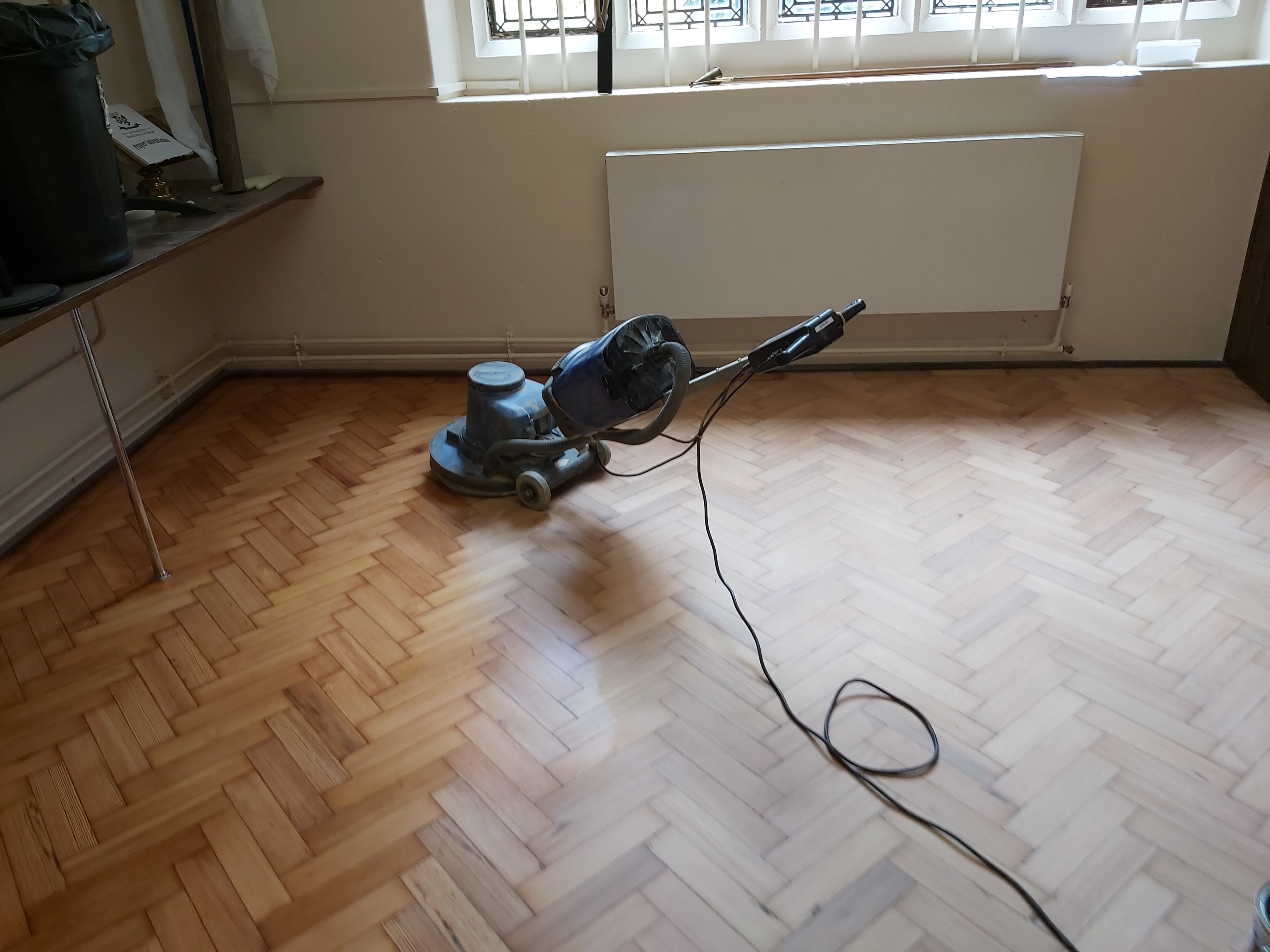 Hardwood floor after sanding work in HA1