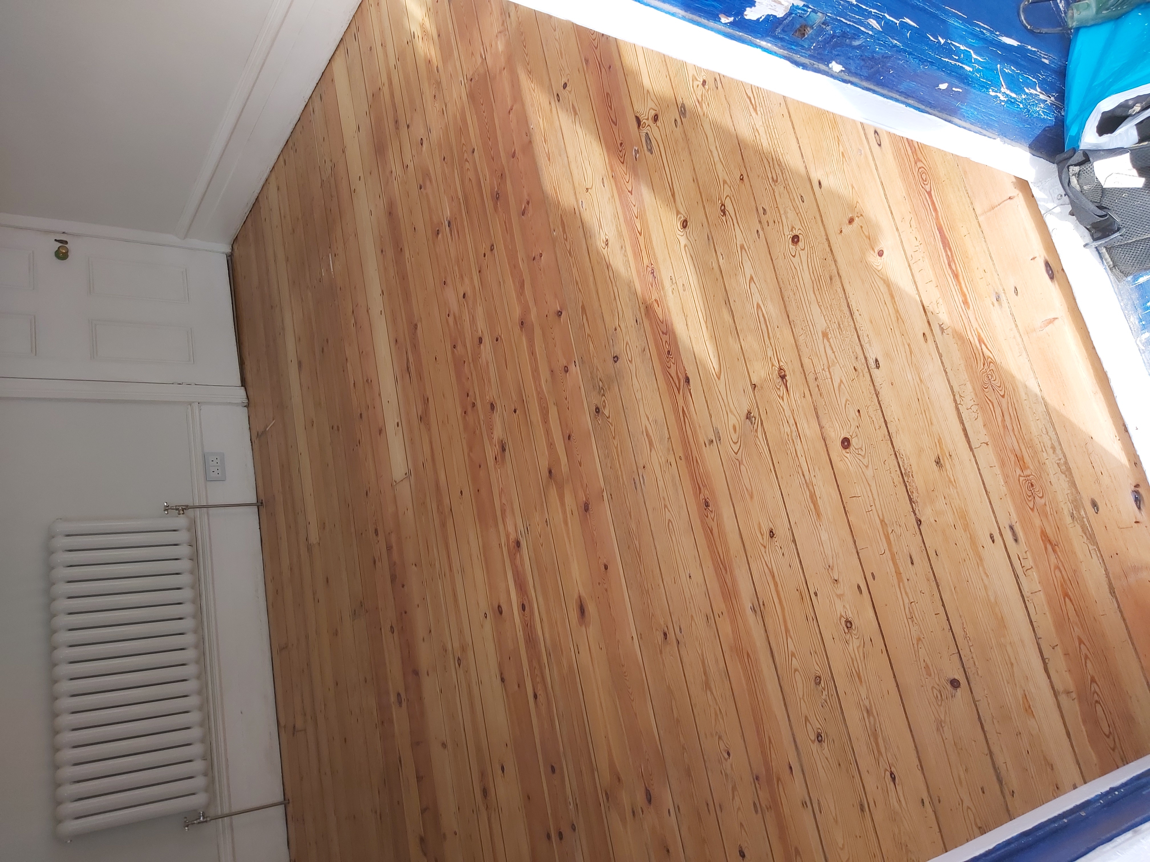 Floorboards floor after sanding work in HA1