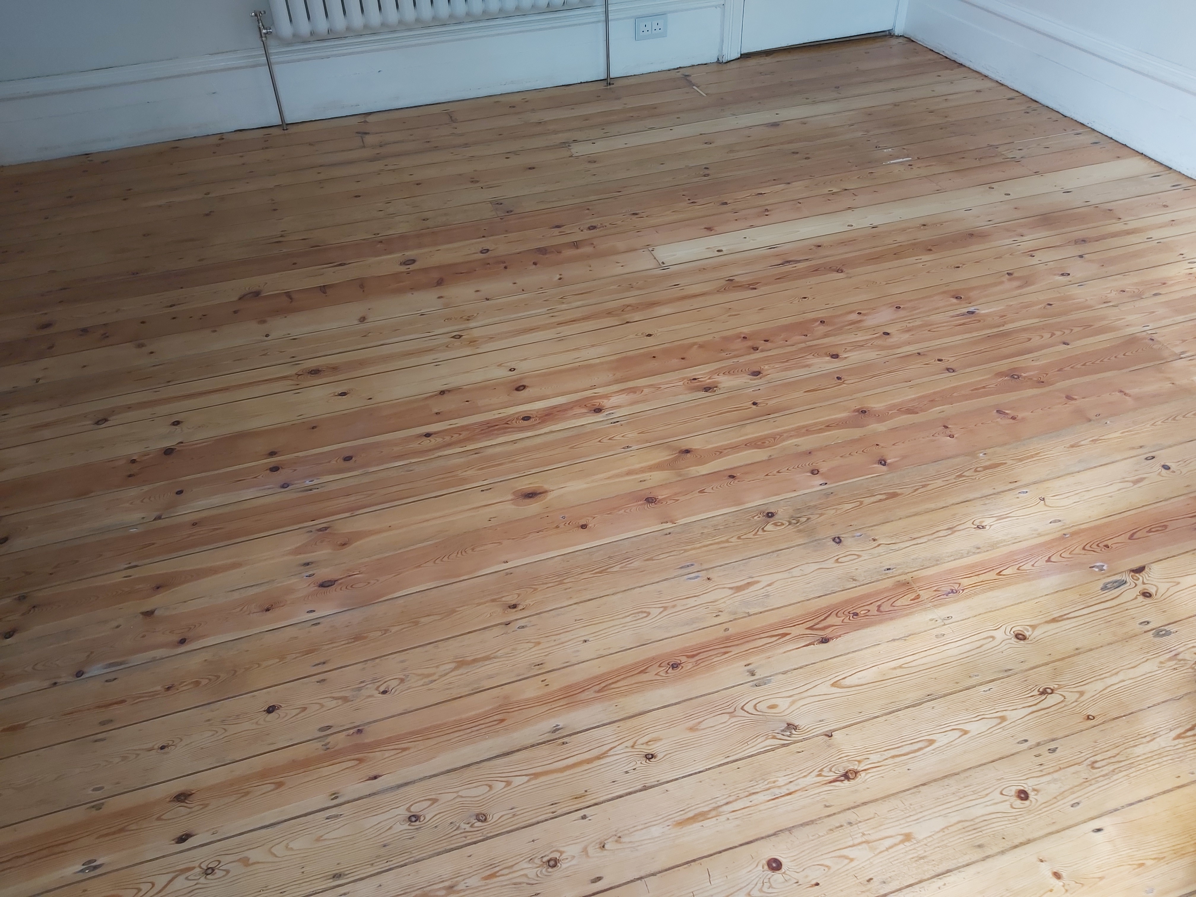Floorboards floor after sanding work in HA1