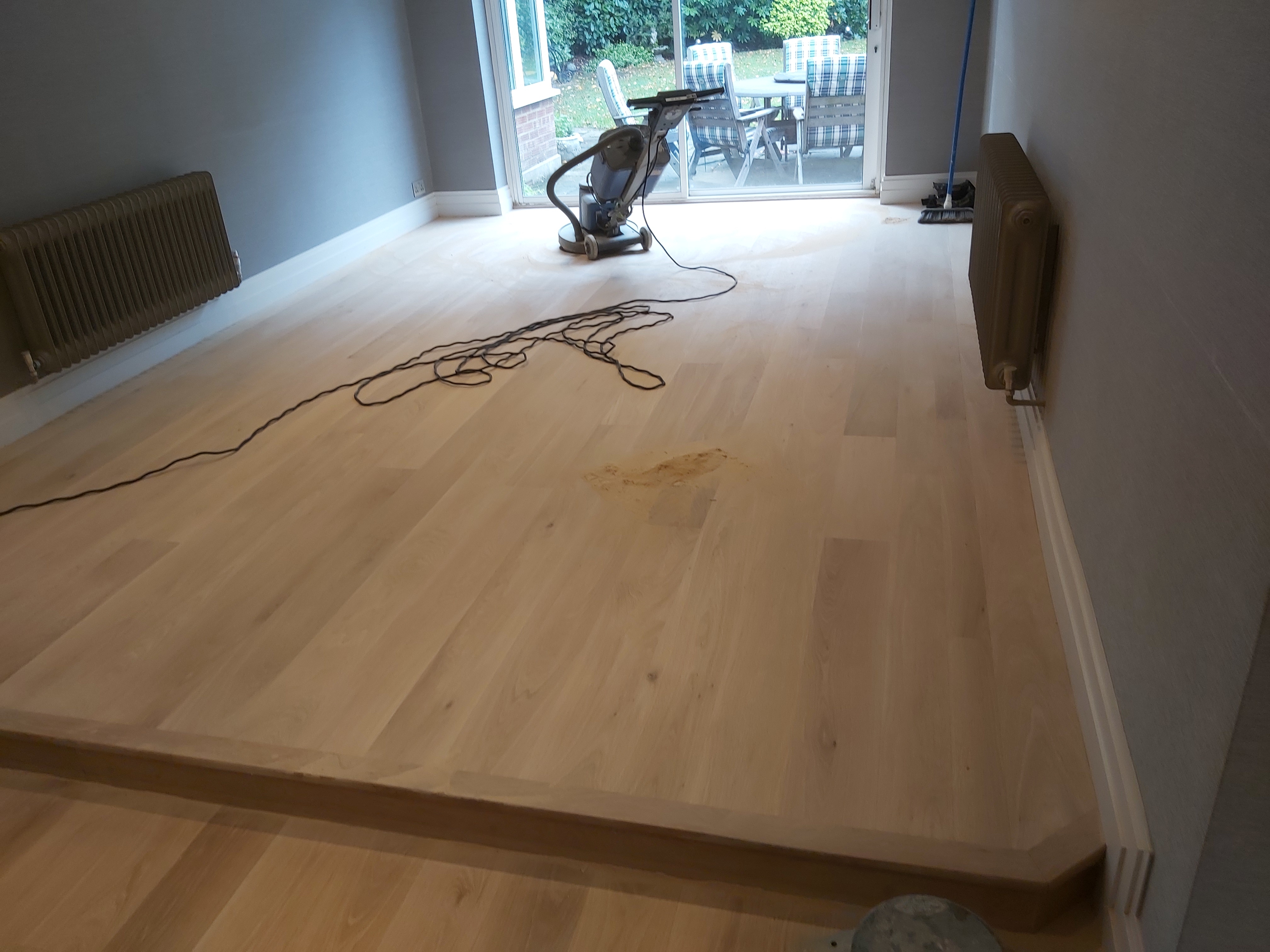 Hardwood floor after sanding work in HA6
