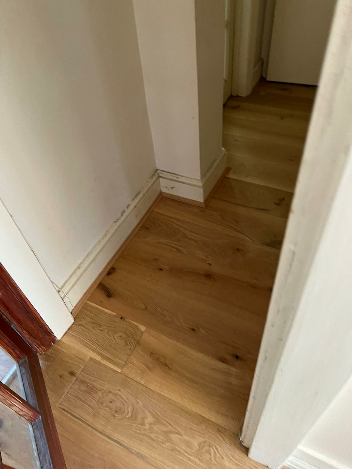 Engineered Wood floor after fitting work in HA8
