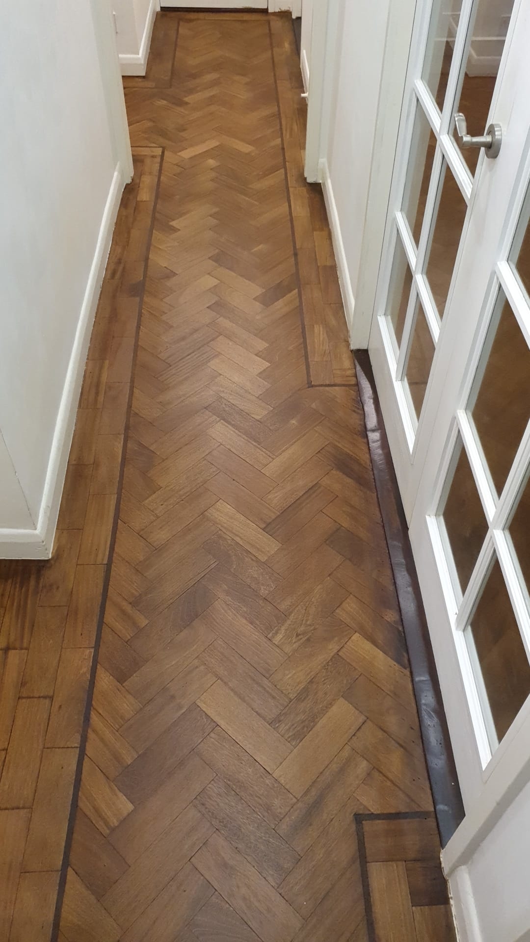 Parquet floor after sanding work in HA9