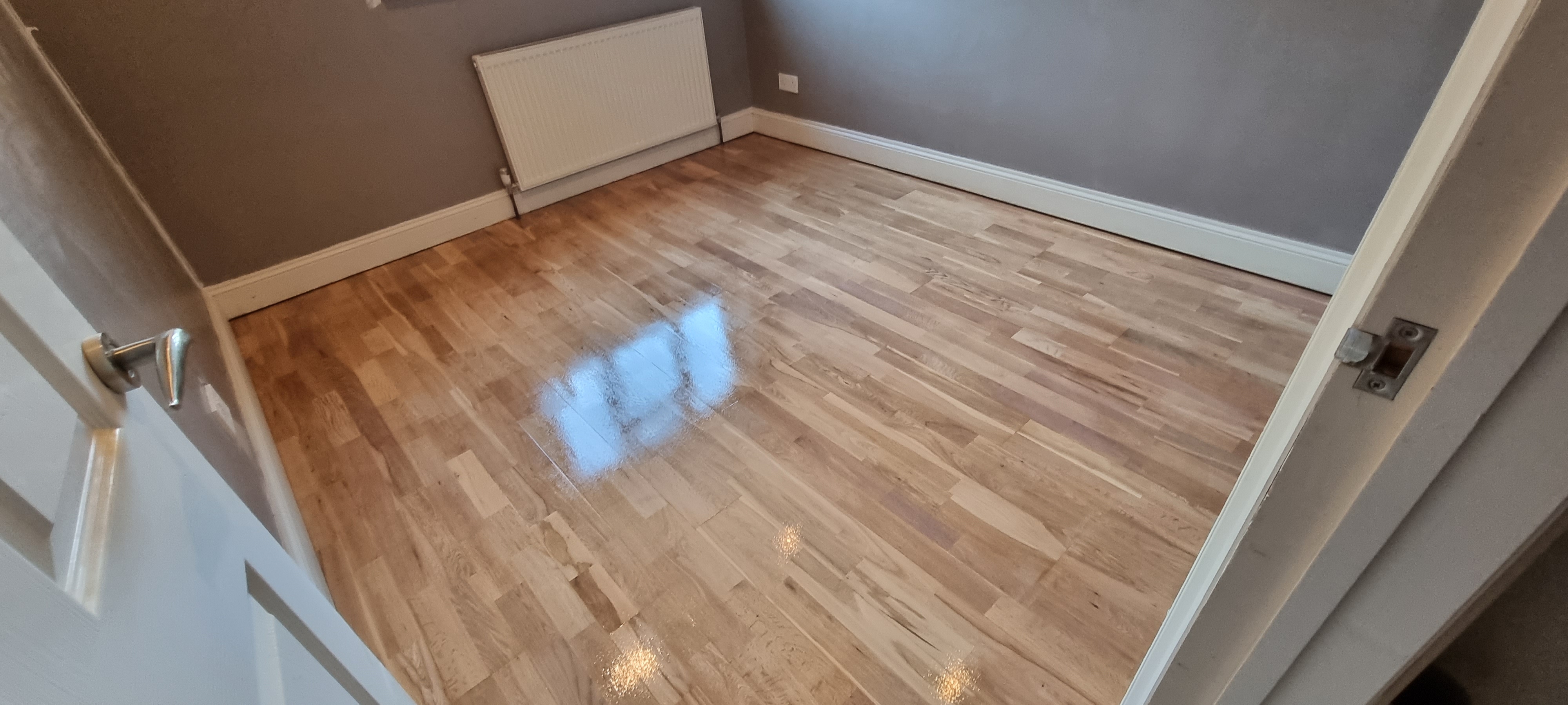 Hardwood floor after sanding work in KT20
