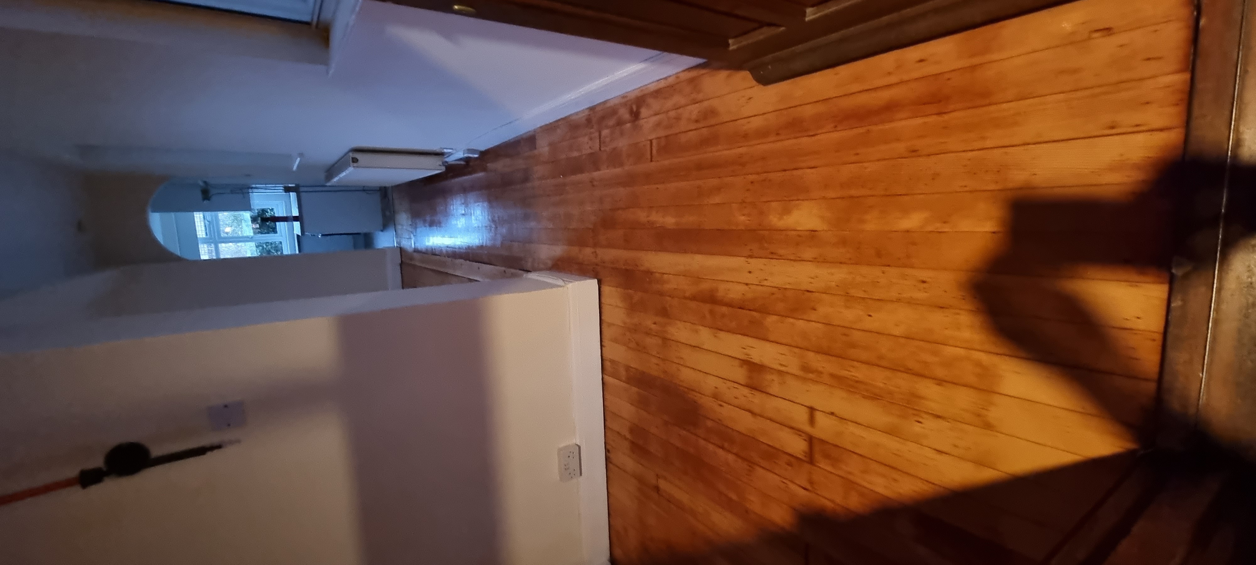 Floorboards floor after sanding work in KT2