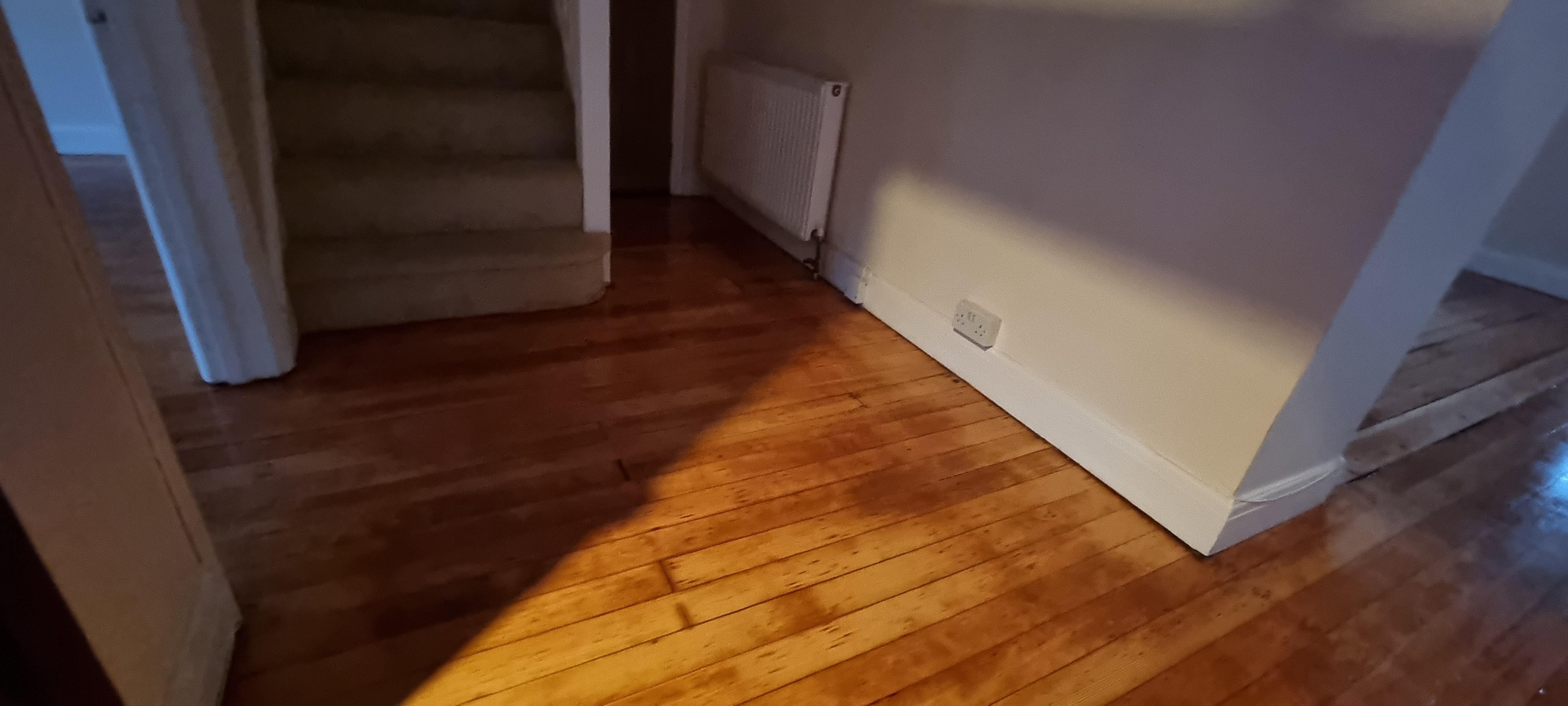 Floorboards floor after sanding work in KT2