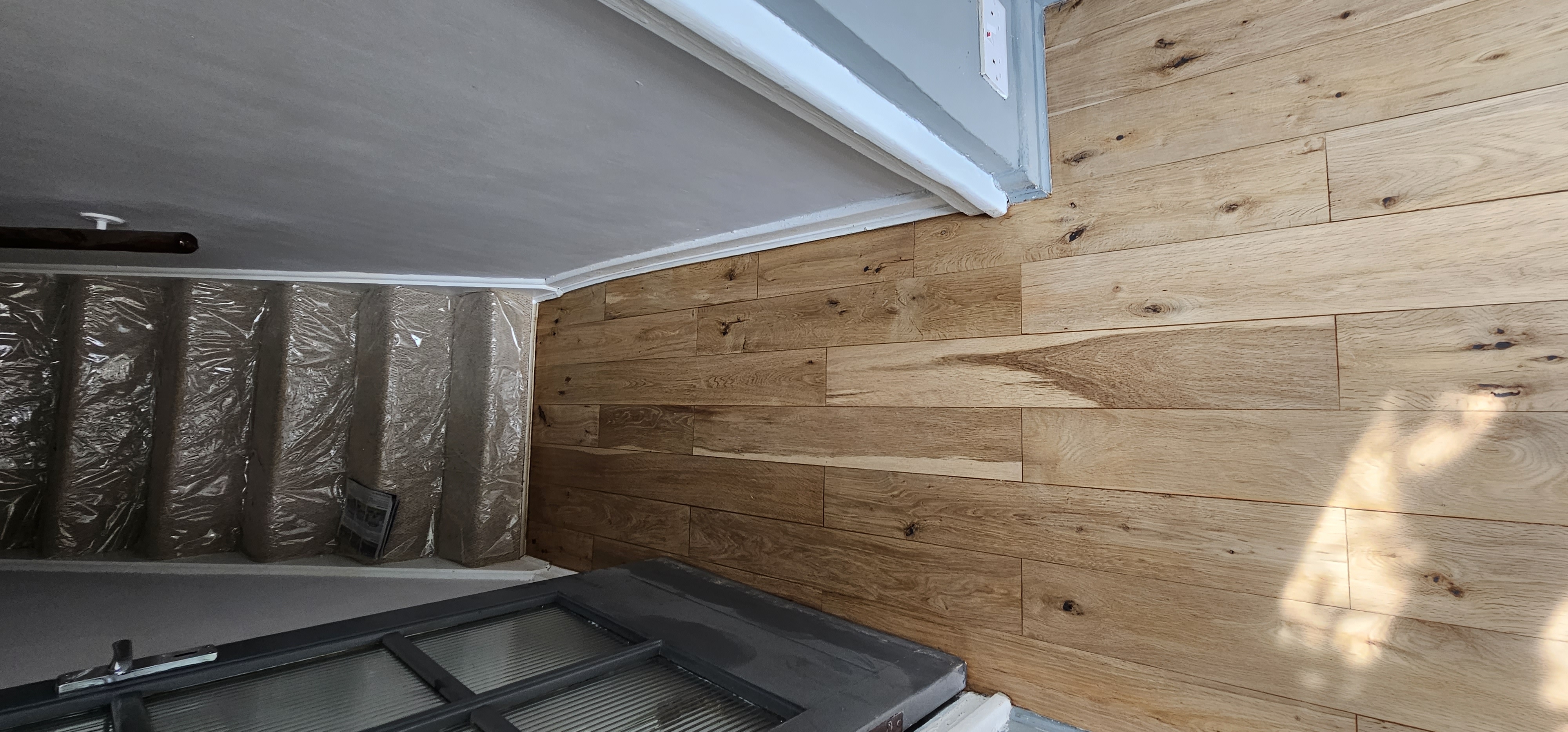 Hardwood floor after sanding work in KT6