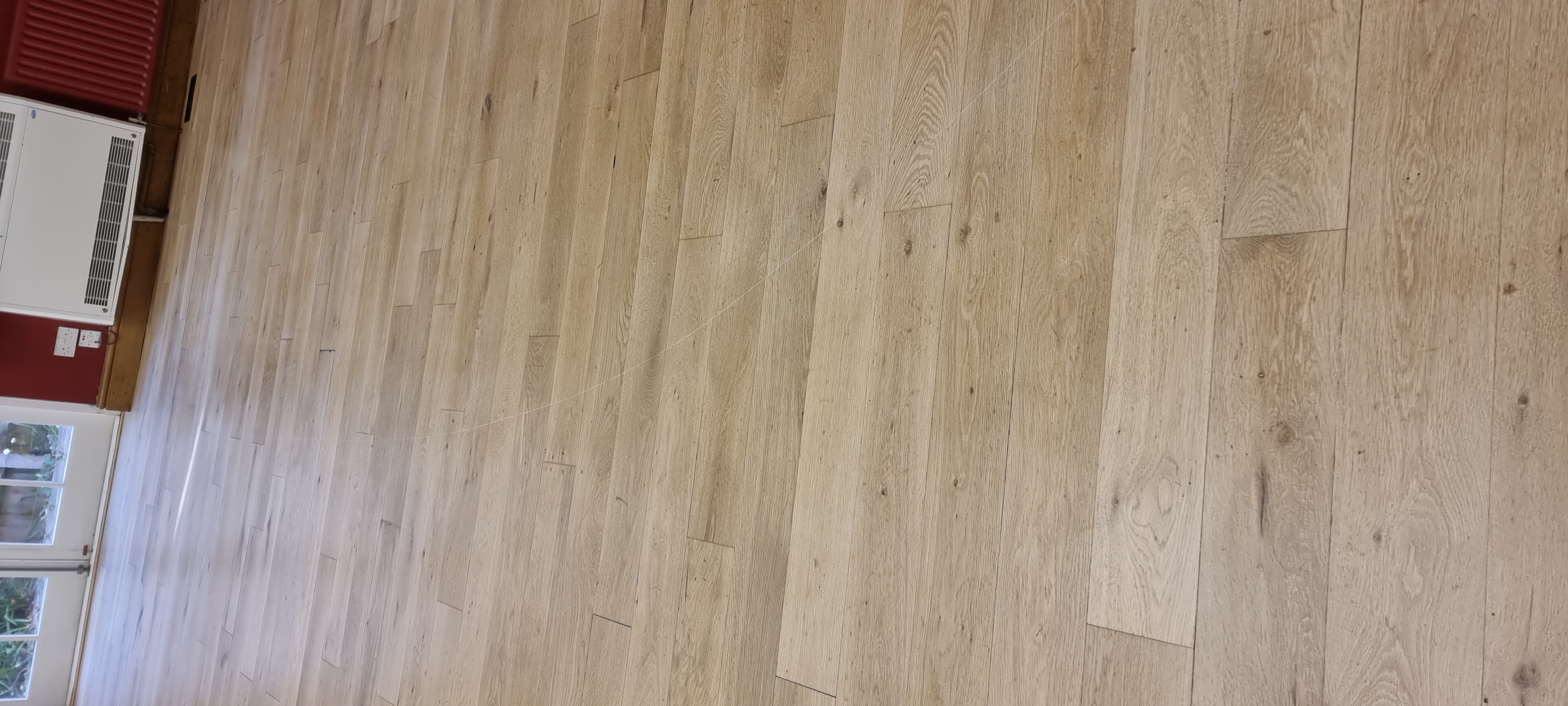 Hardwood floor after sanding work in KT7