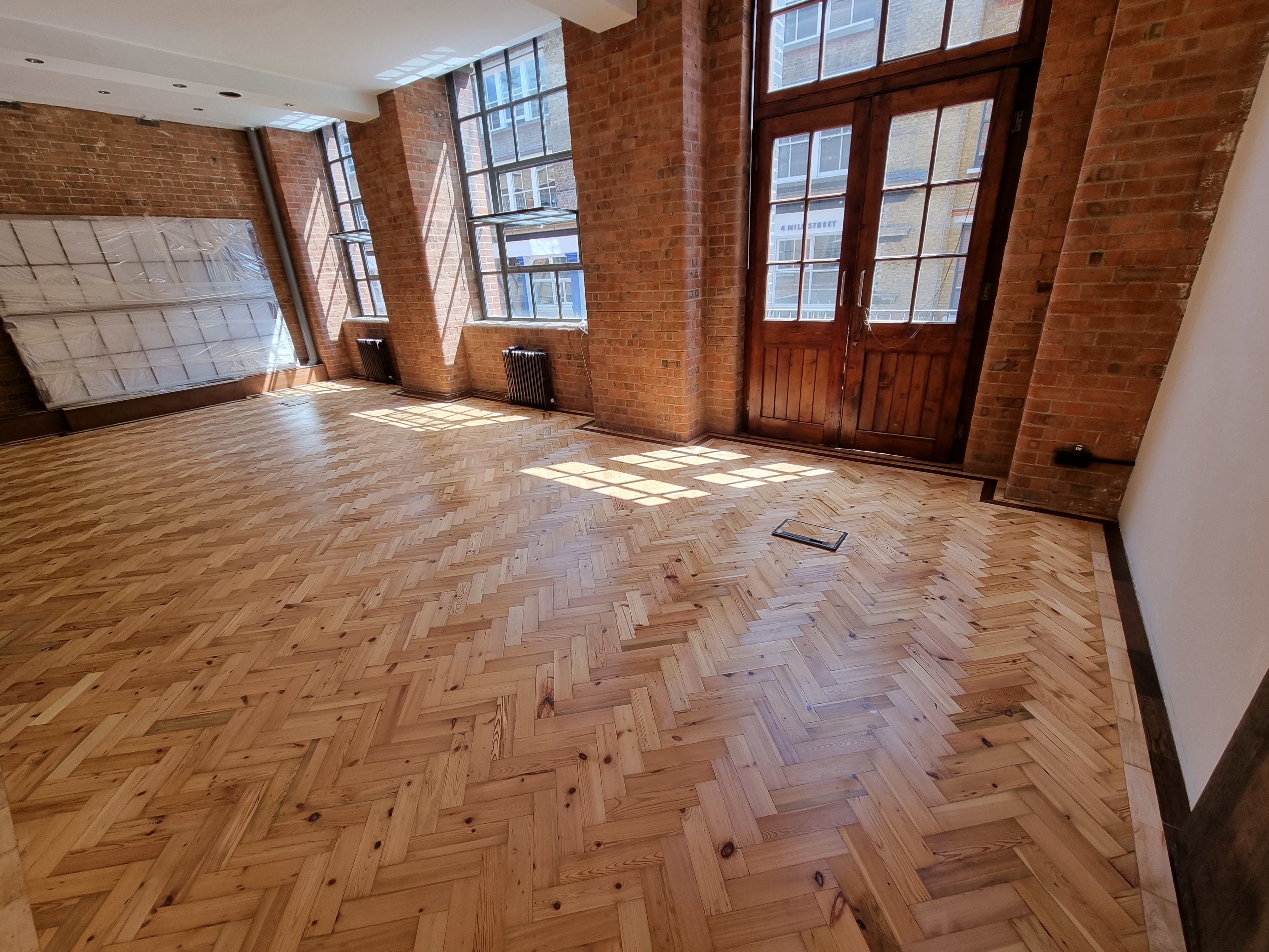 Parquet floor after sanding work in N1