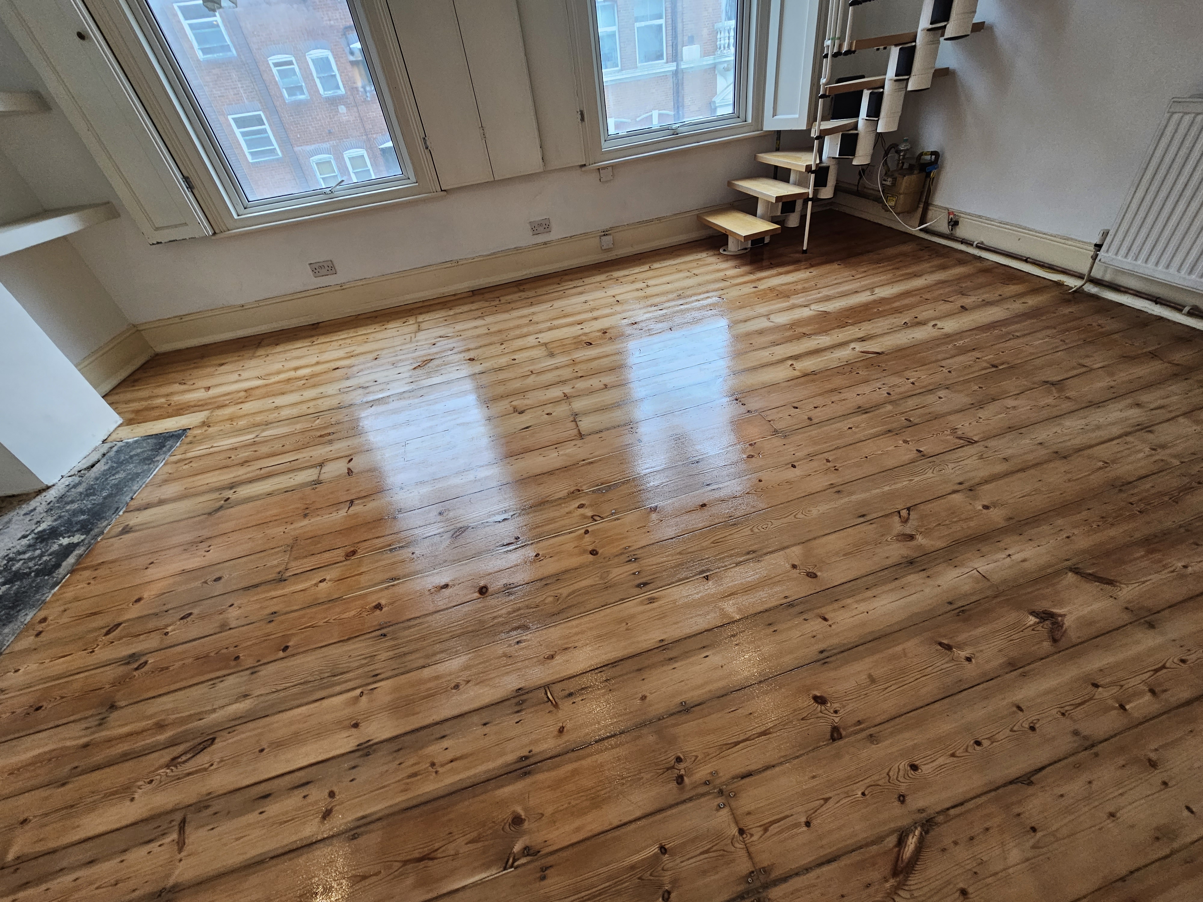 Floorboards floor after sanding work in N16