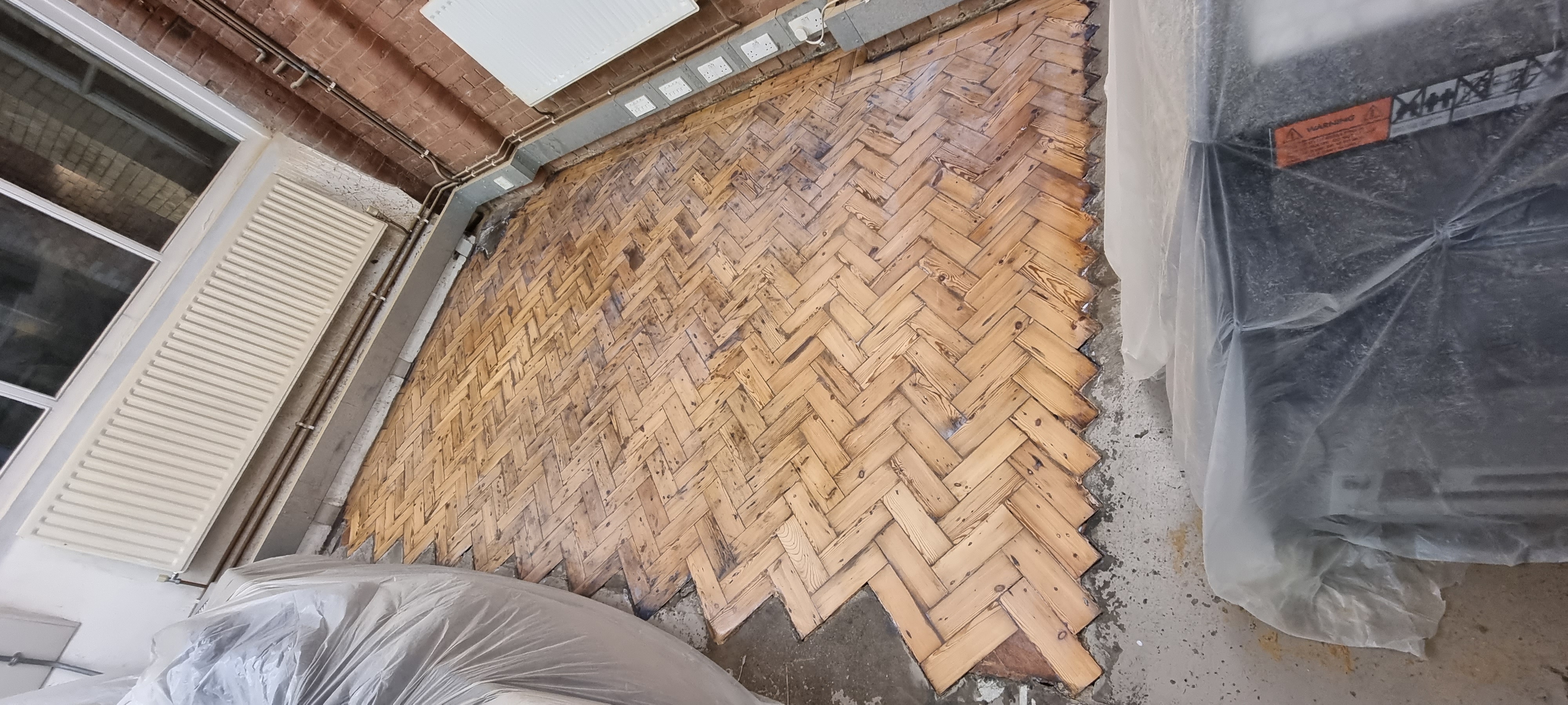 Parquet floor after sanding work in N1