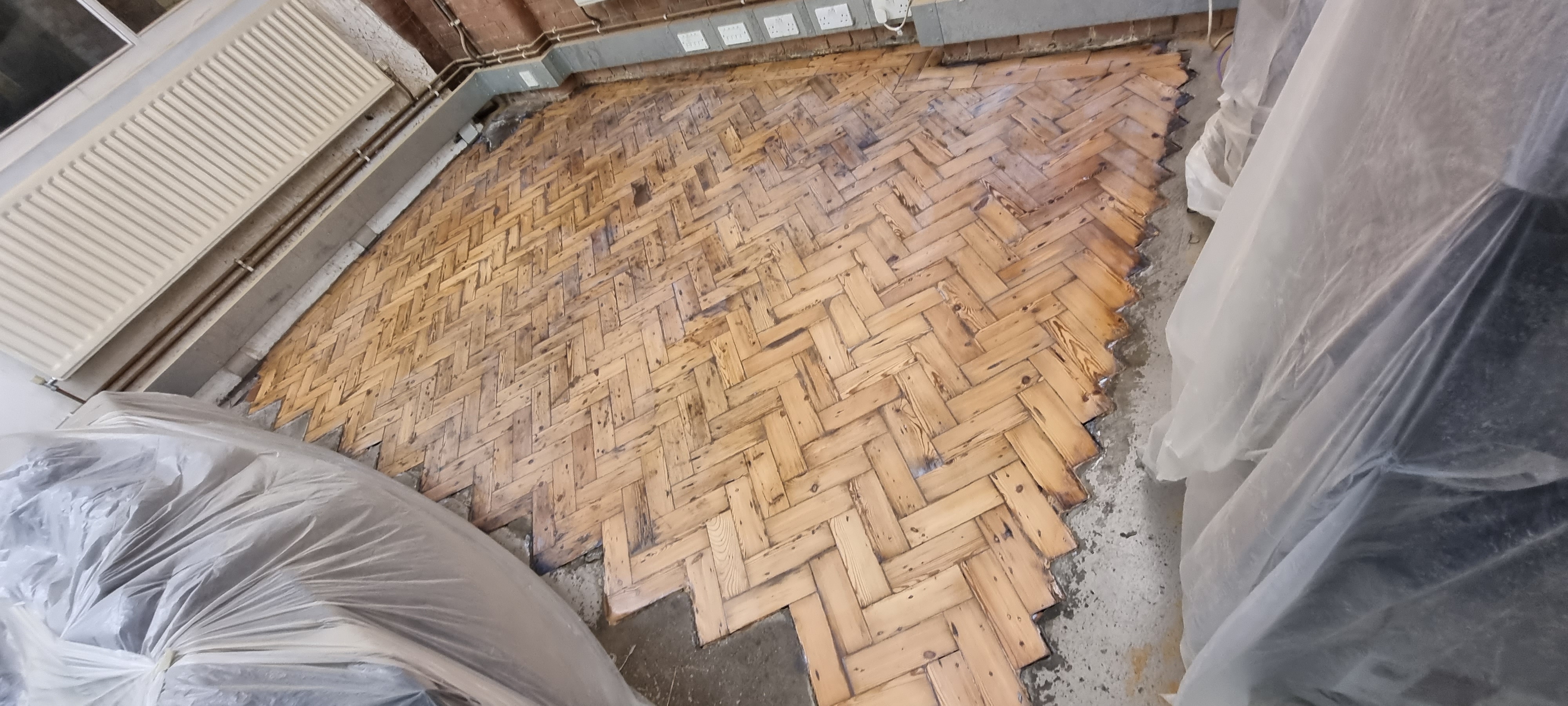 Parquet floor after sanding work in N1