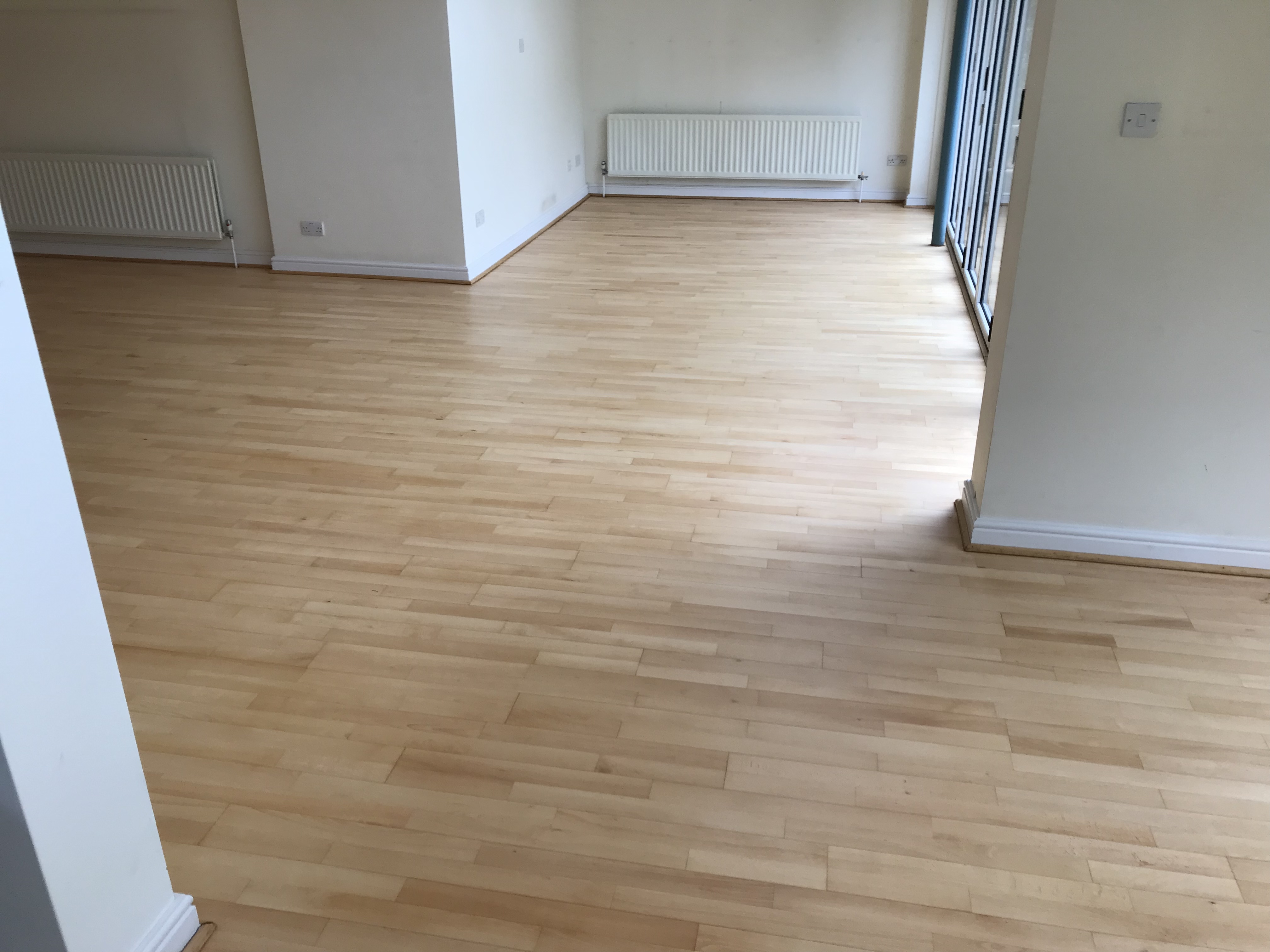 Hardwood floor after sanding work in N6