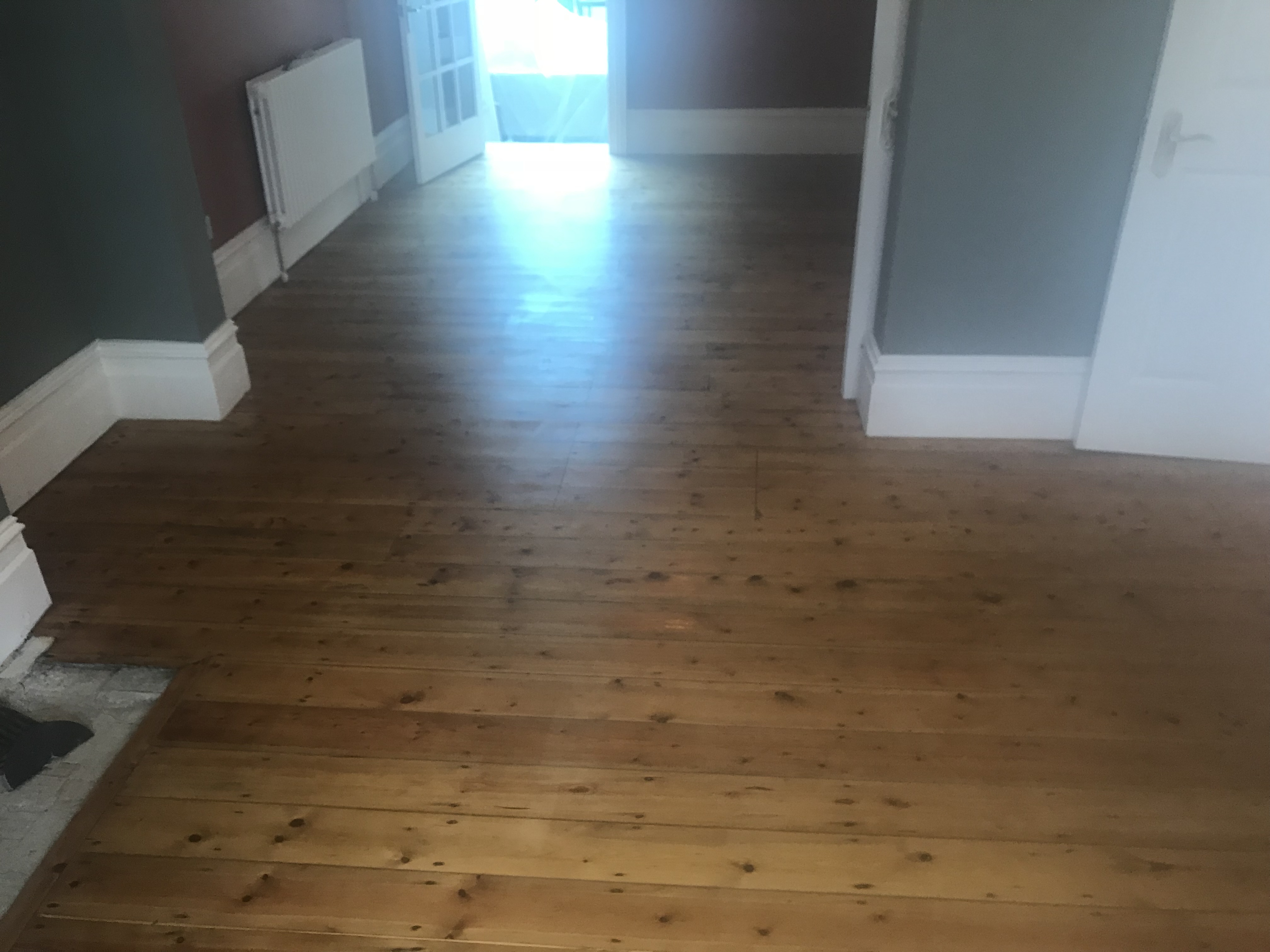 Floorboards floor after sanding work in N8