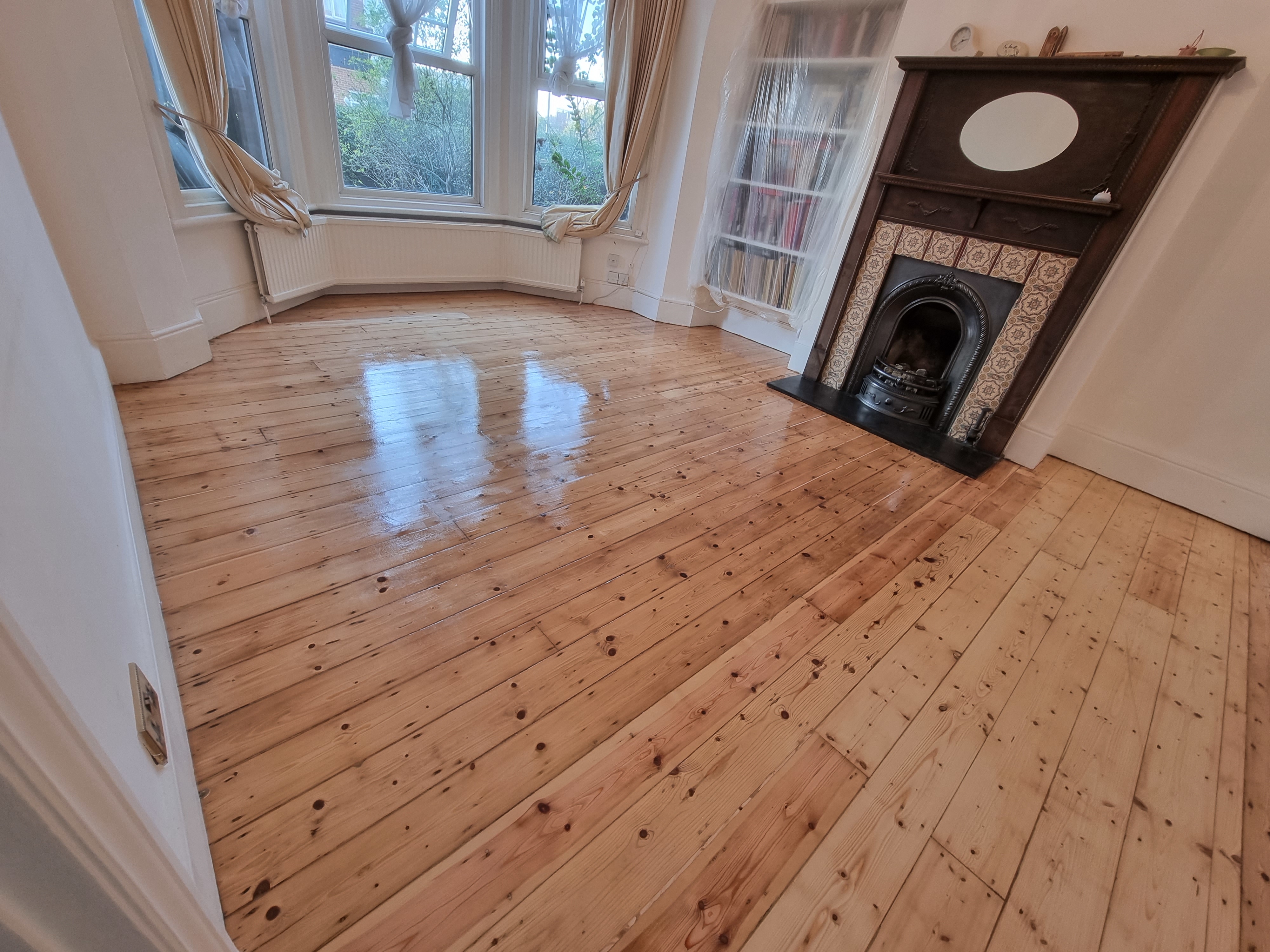 Floorboards floor after sanding work in NW10
