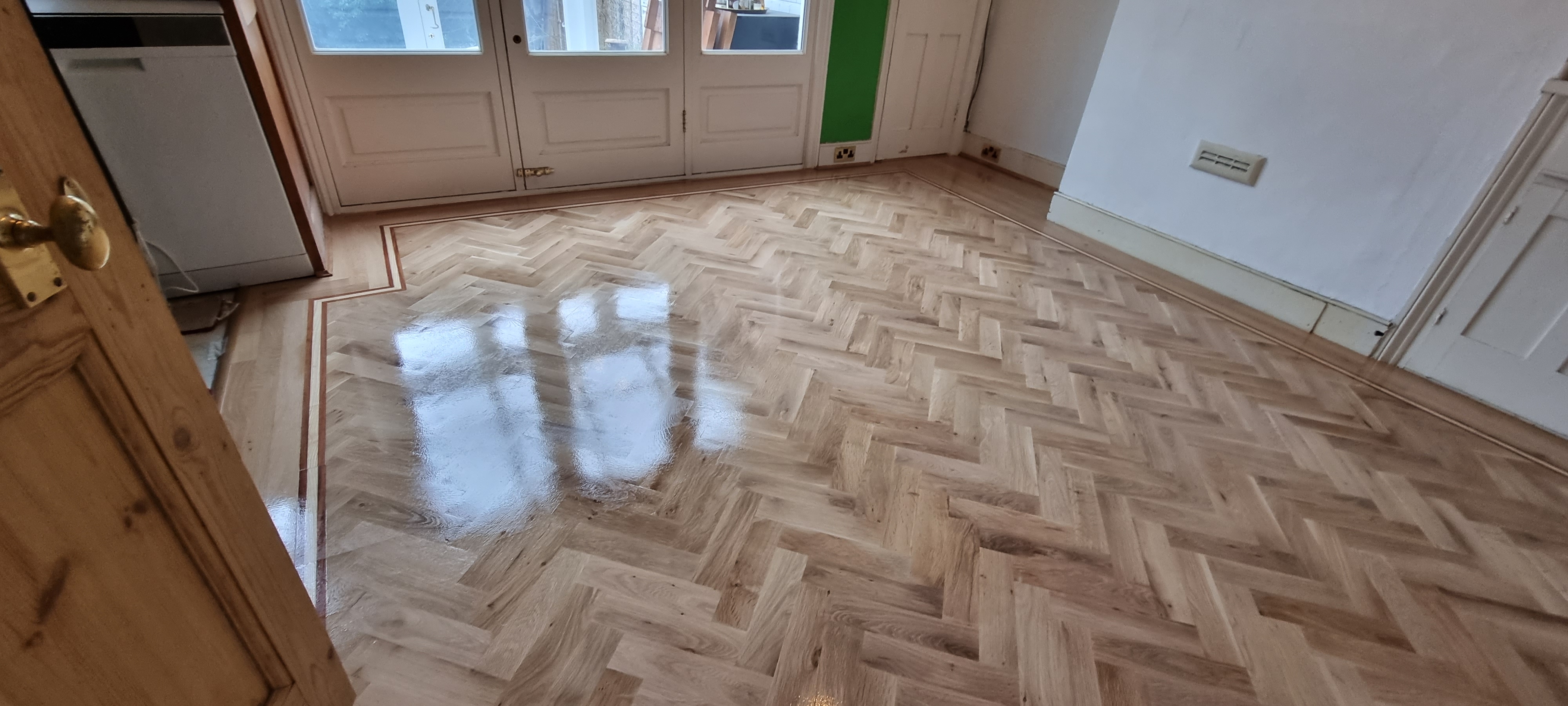 Parquet floor after sanding work in NW10