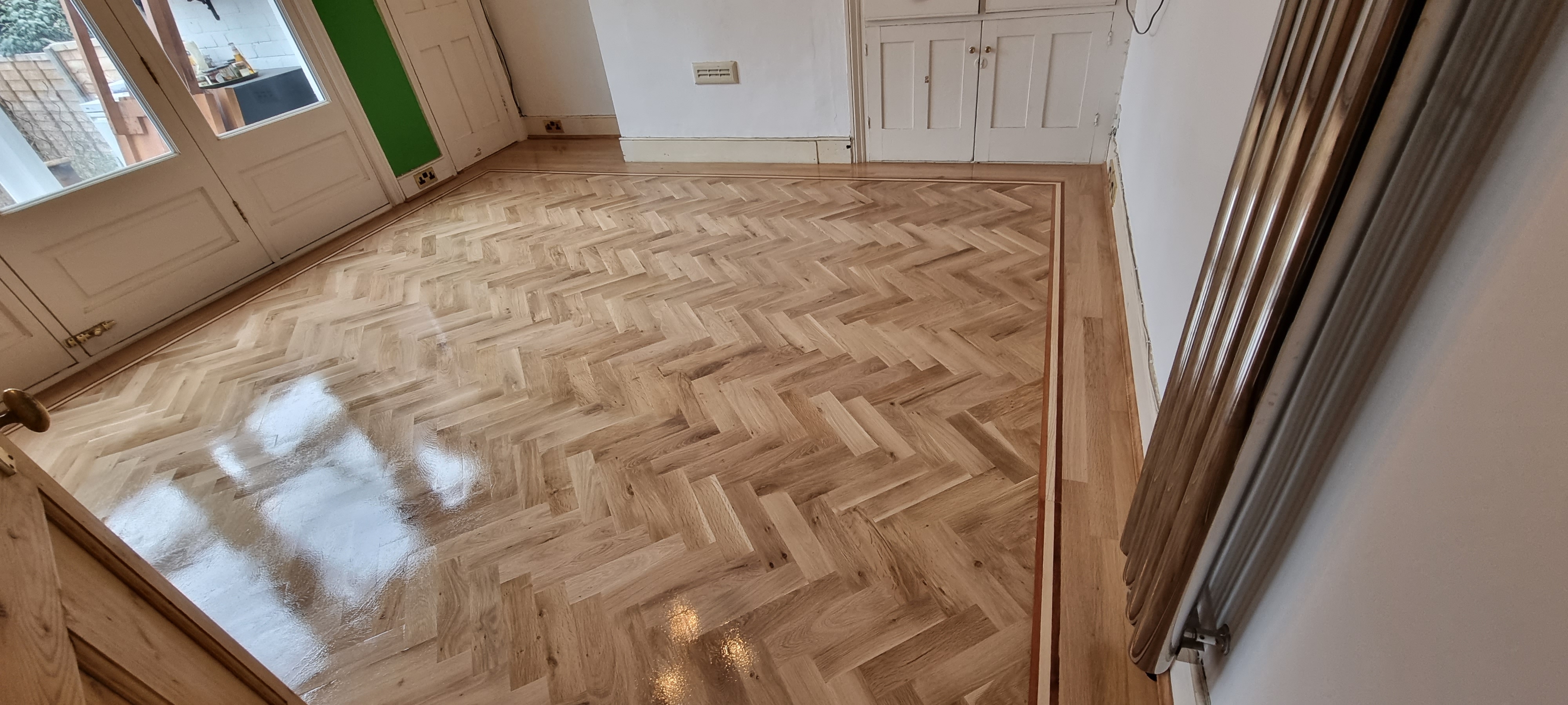 Parquet floor after sanding work in NW10