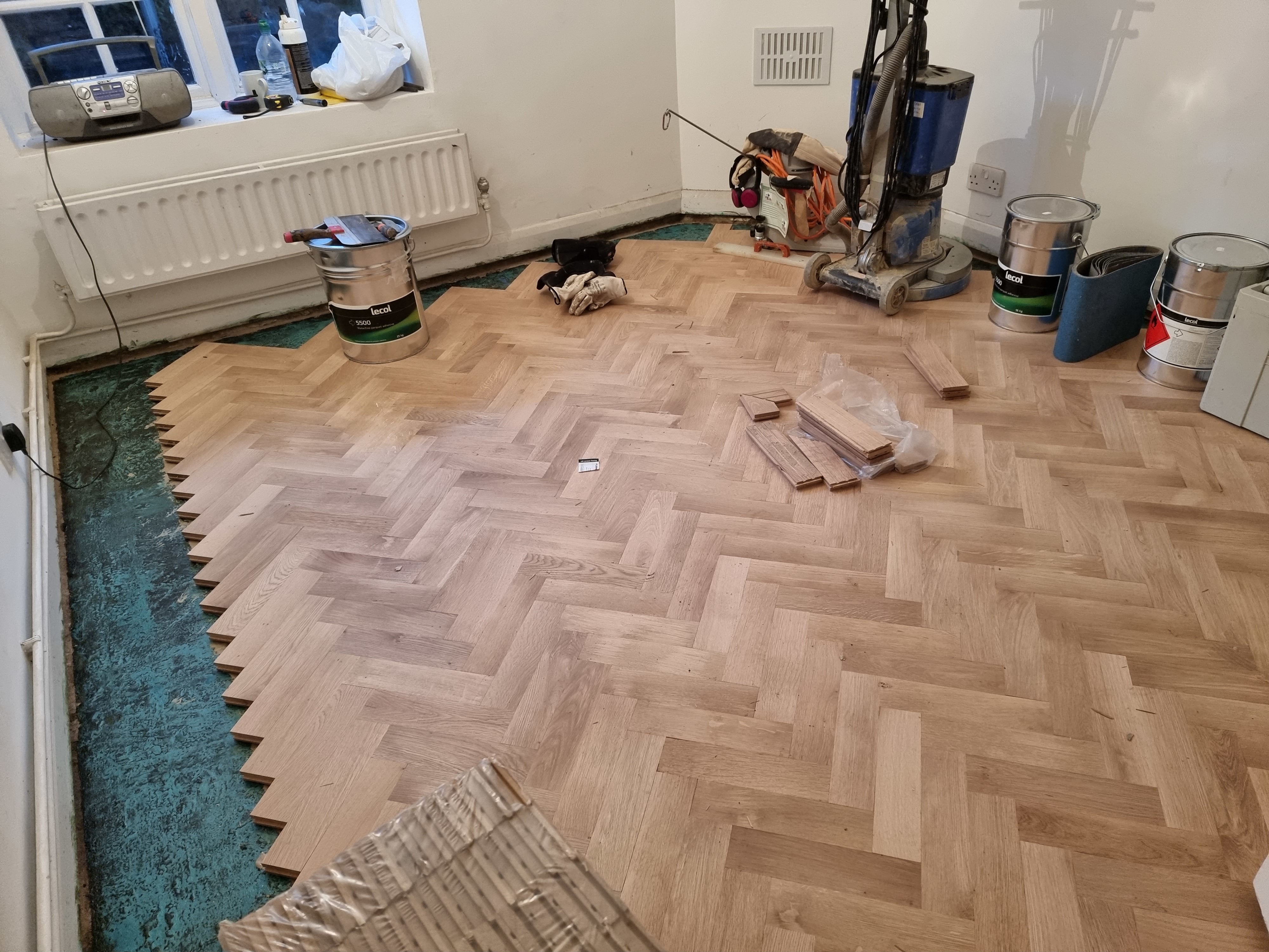 Parquet floor after sanding work in NW11