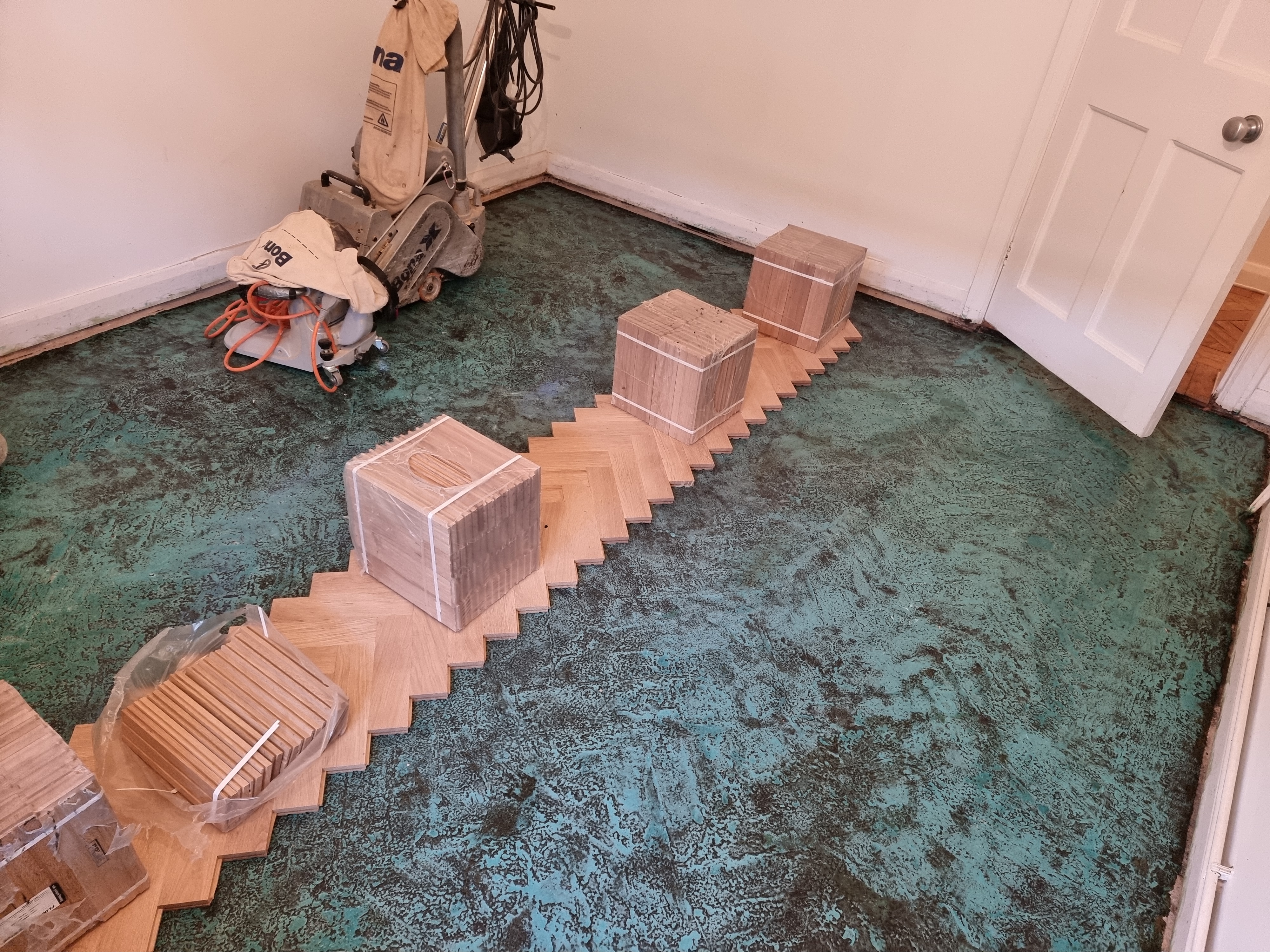 Parquet floor after sanding work in NW11