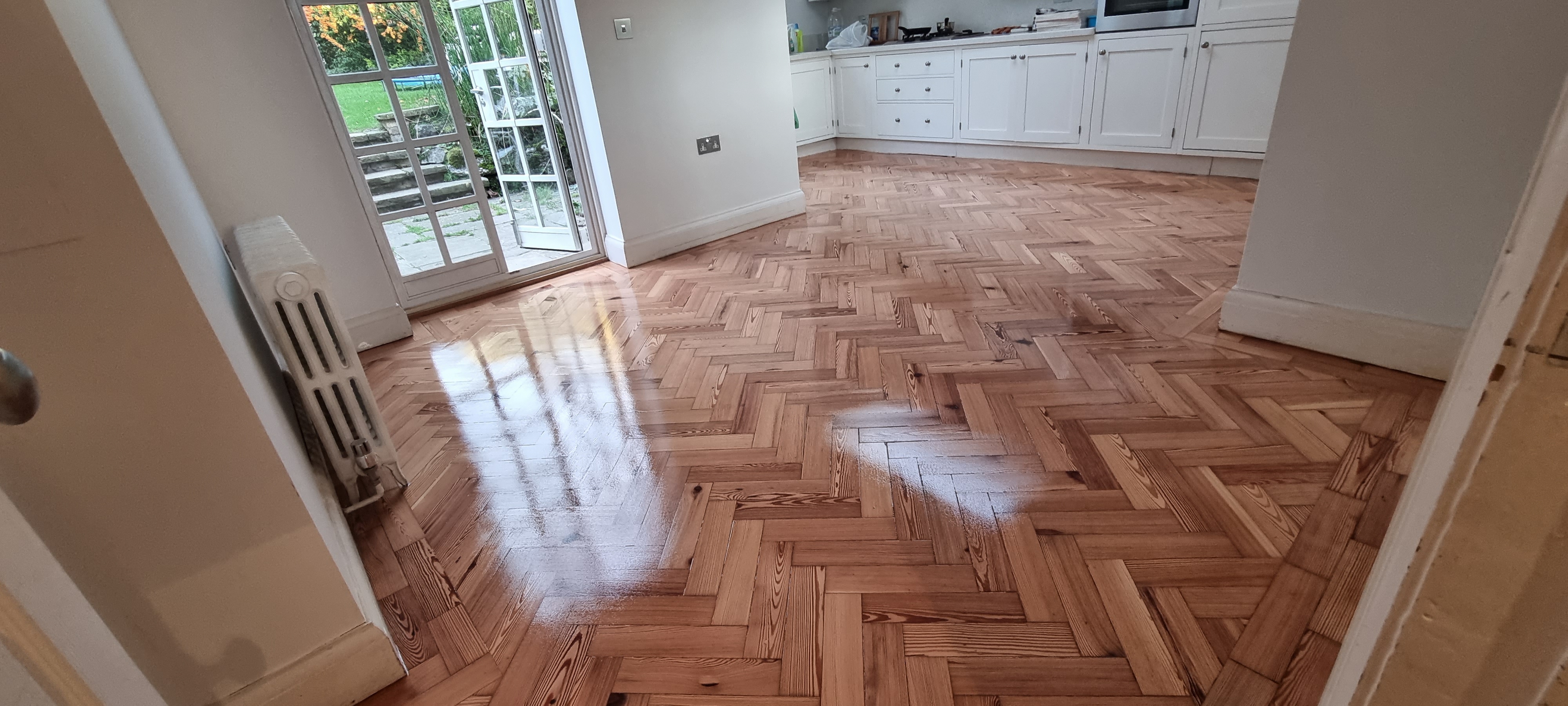 Parquet floor after sanding work in NW11