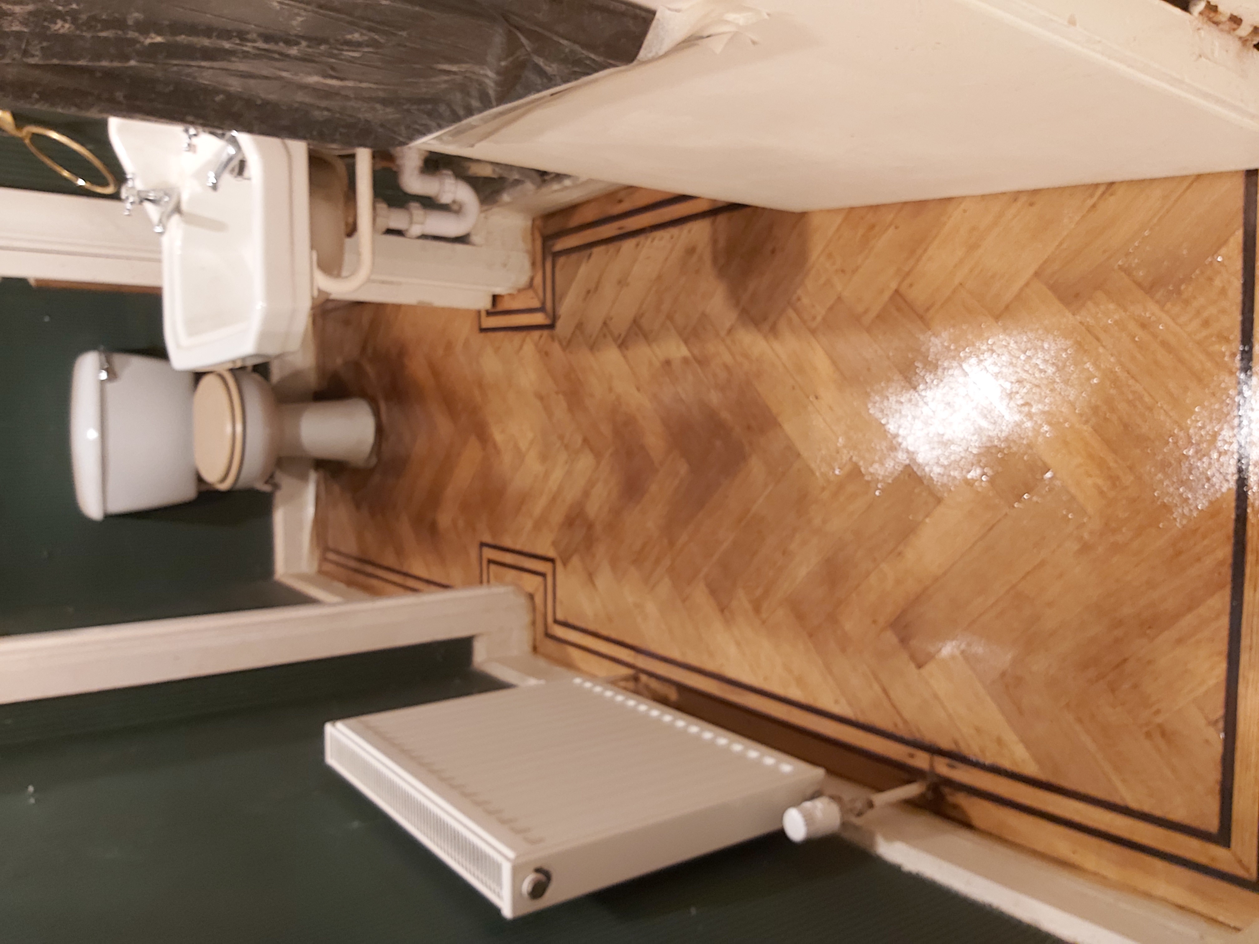 Hardwood floor after sanding work in NW11