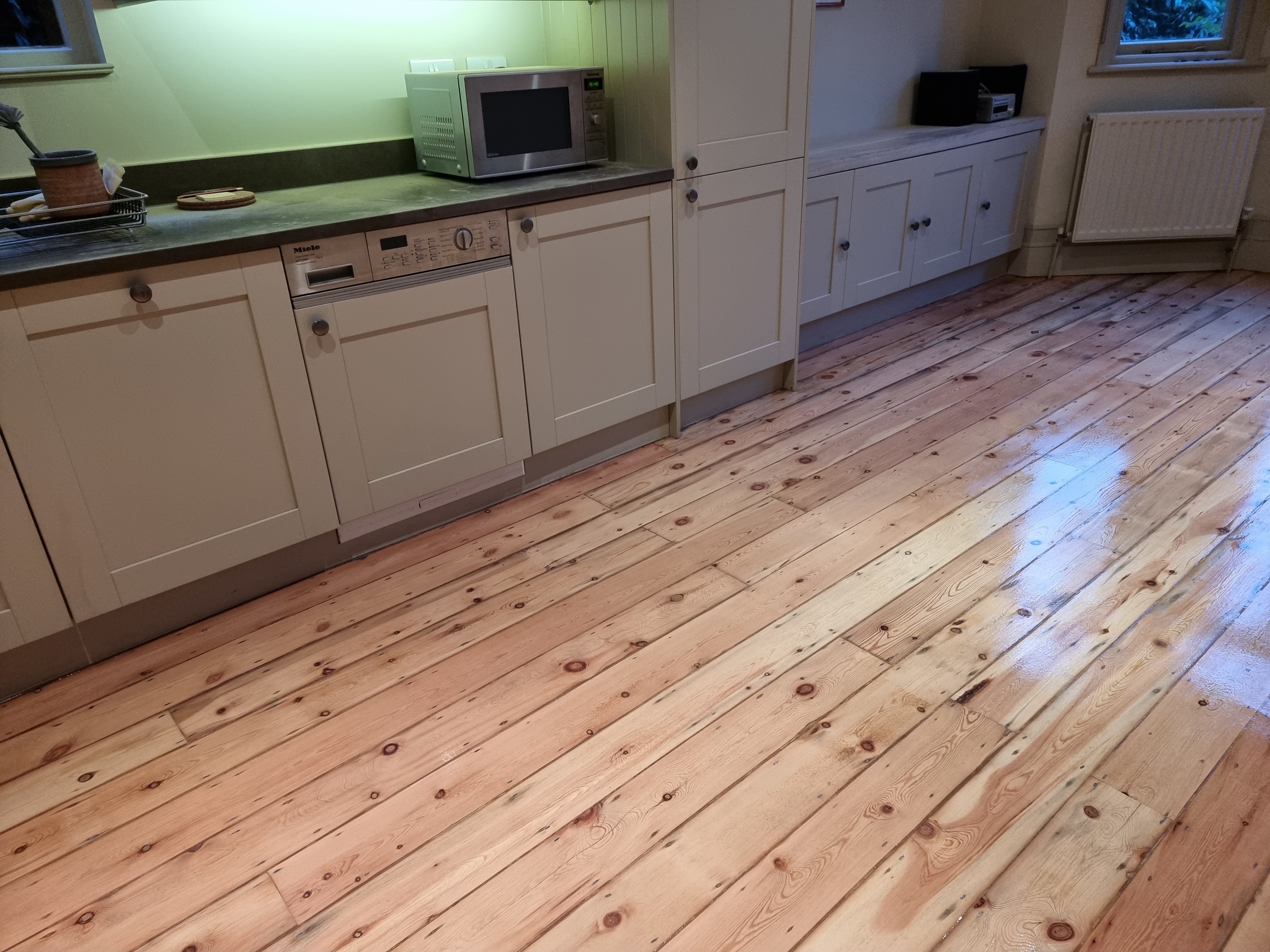 Floorboards floor after sanding work in NW2