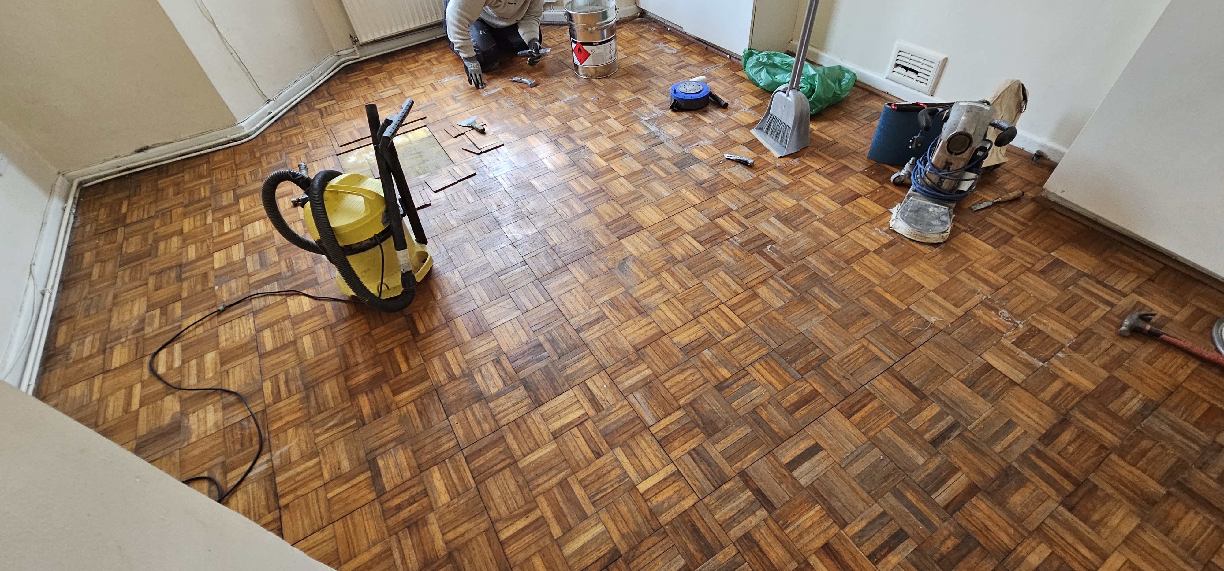Parquet floor after sanding work in NW2