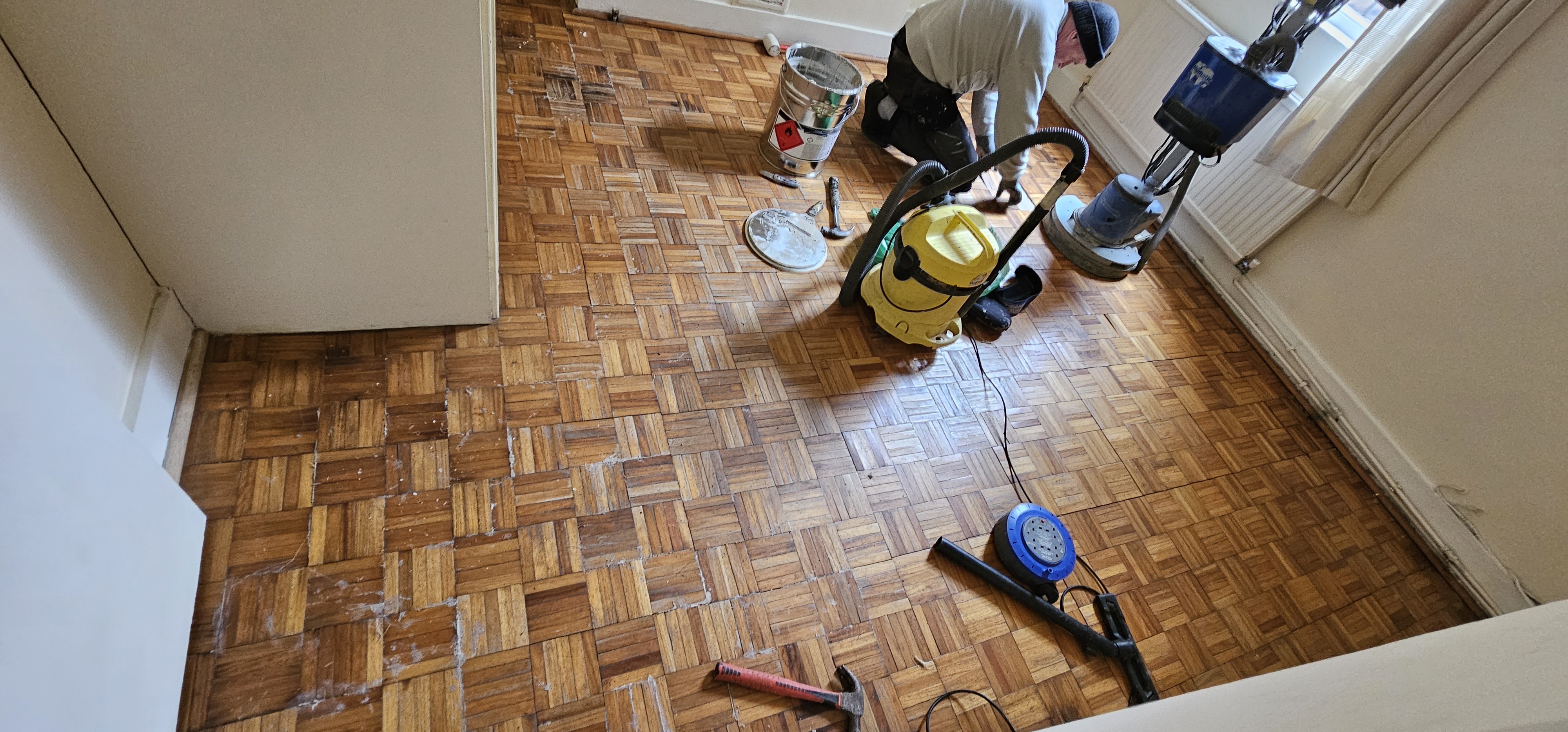 Parquet floor after sanding work in NW2