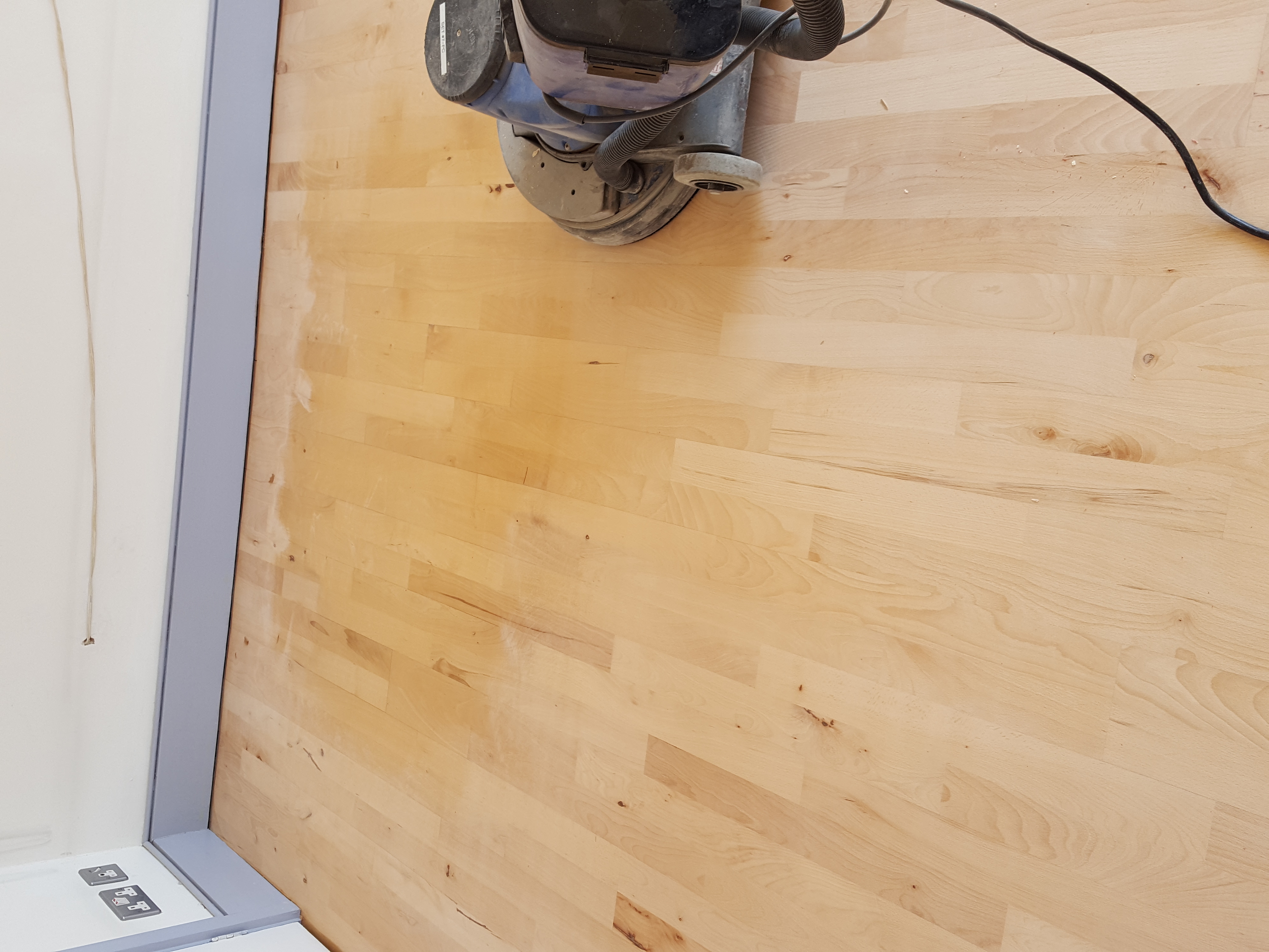 Hardwood floor after sanding work in NW3