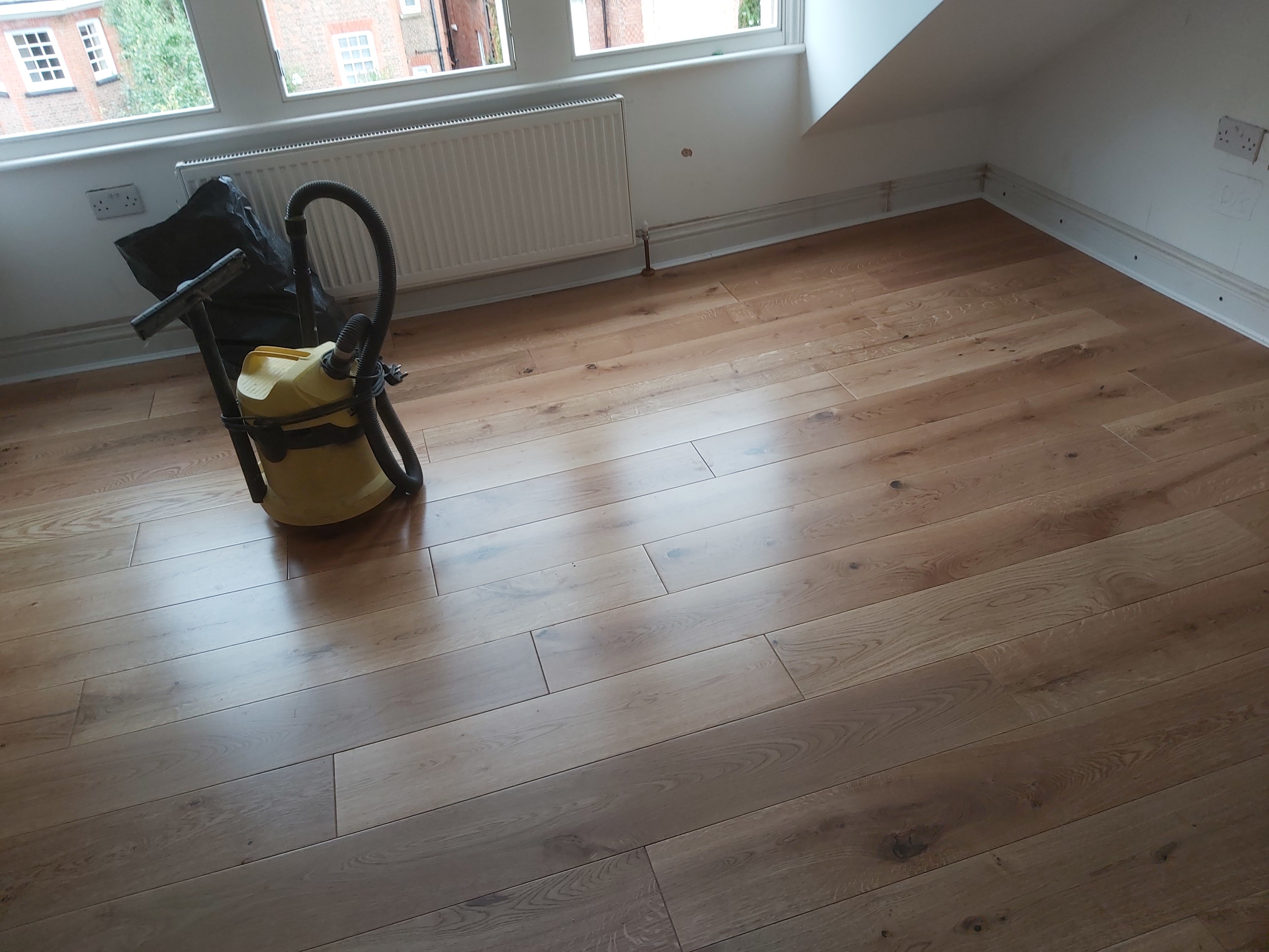 Engineered Wood floor after fitting work in NW3