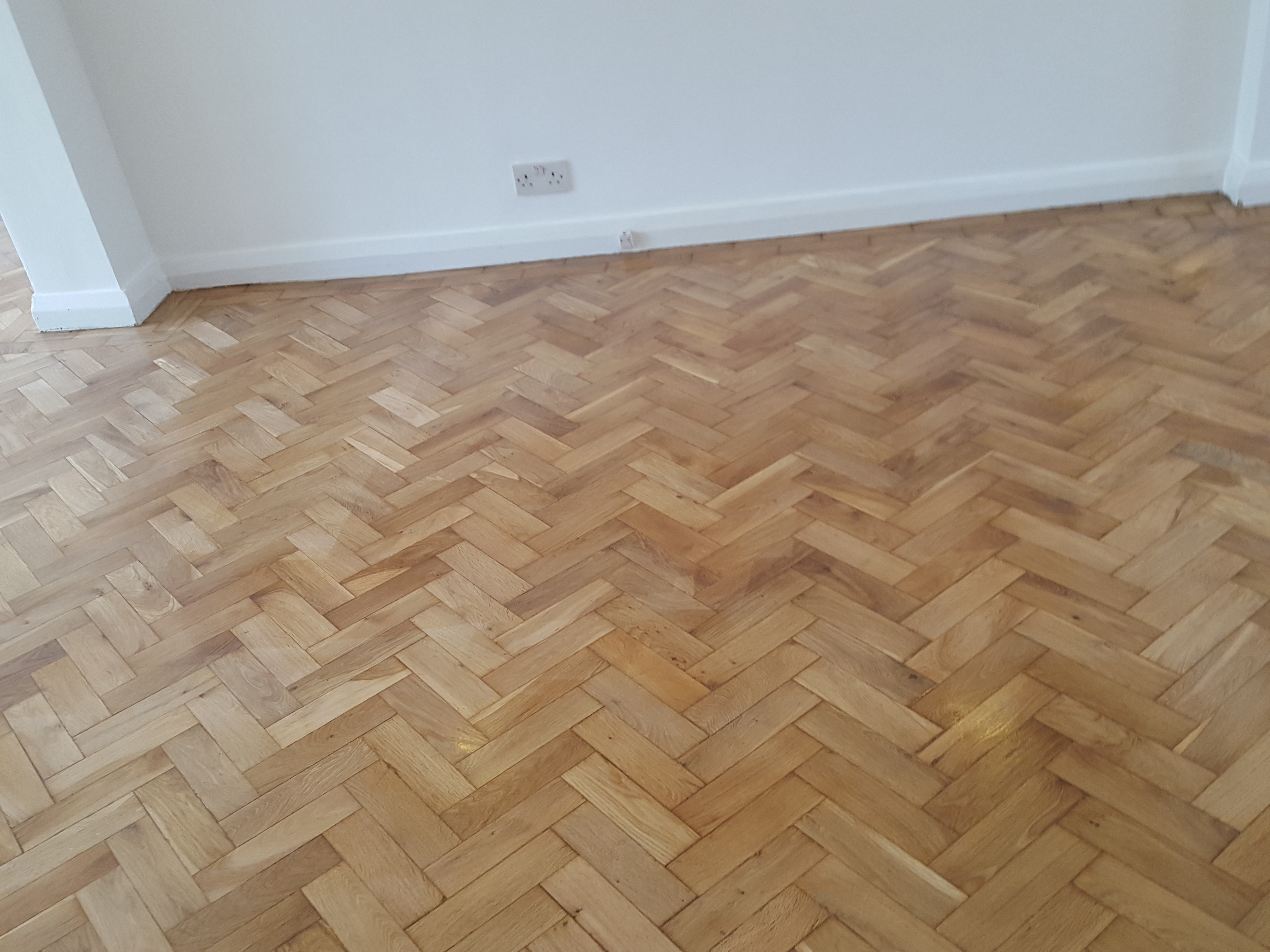 Parquet floor after sanding work in NW4