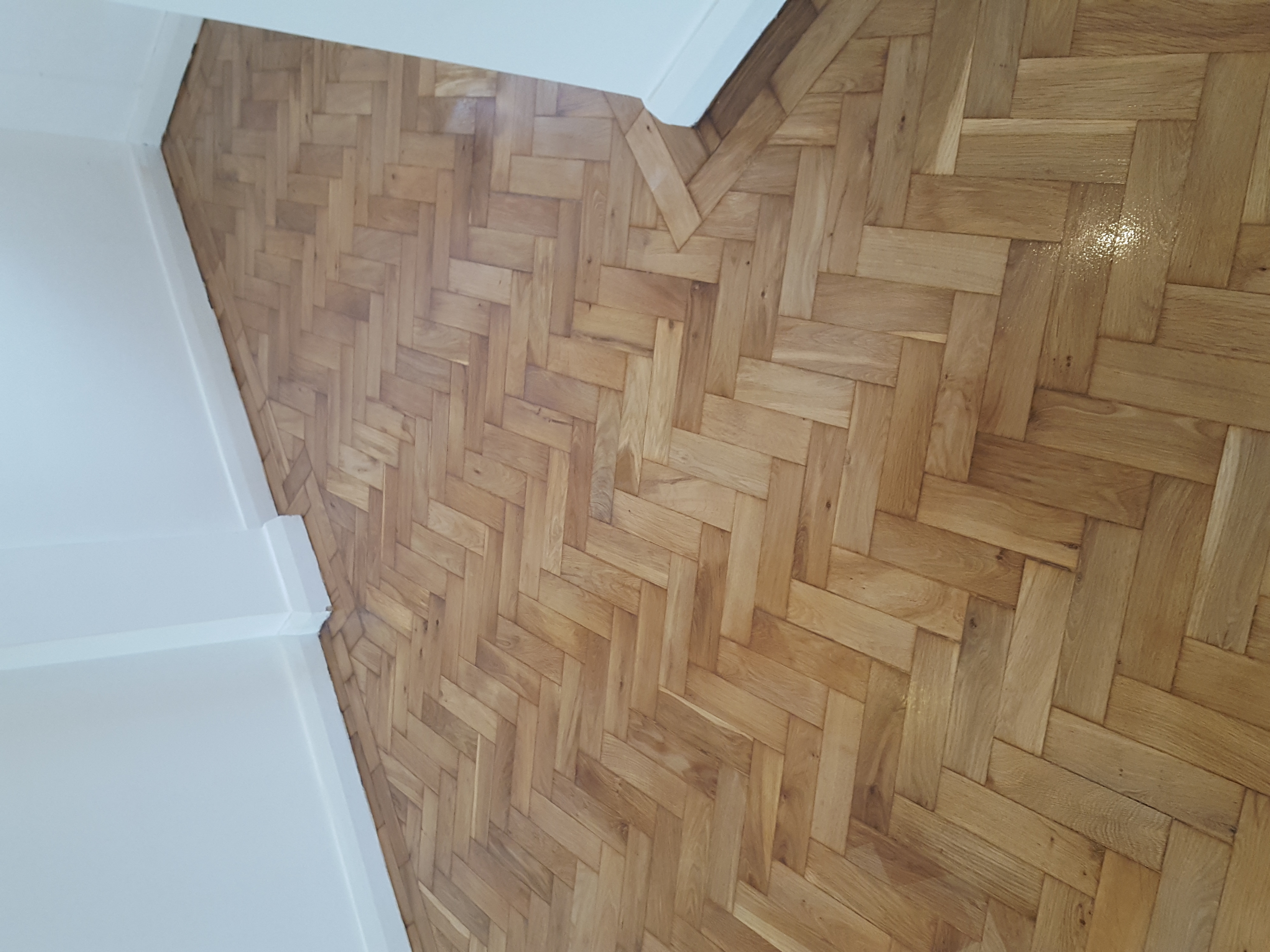 Parquet floor after sanding work in NW4