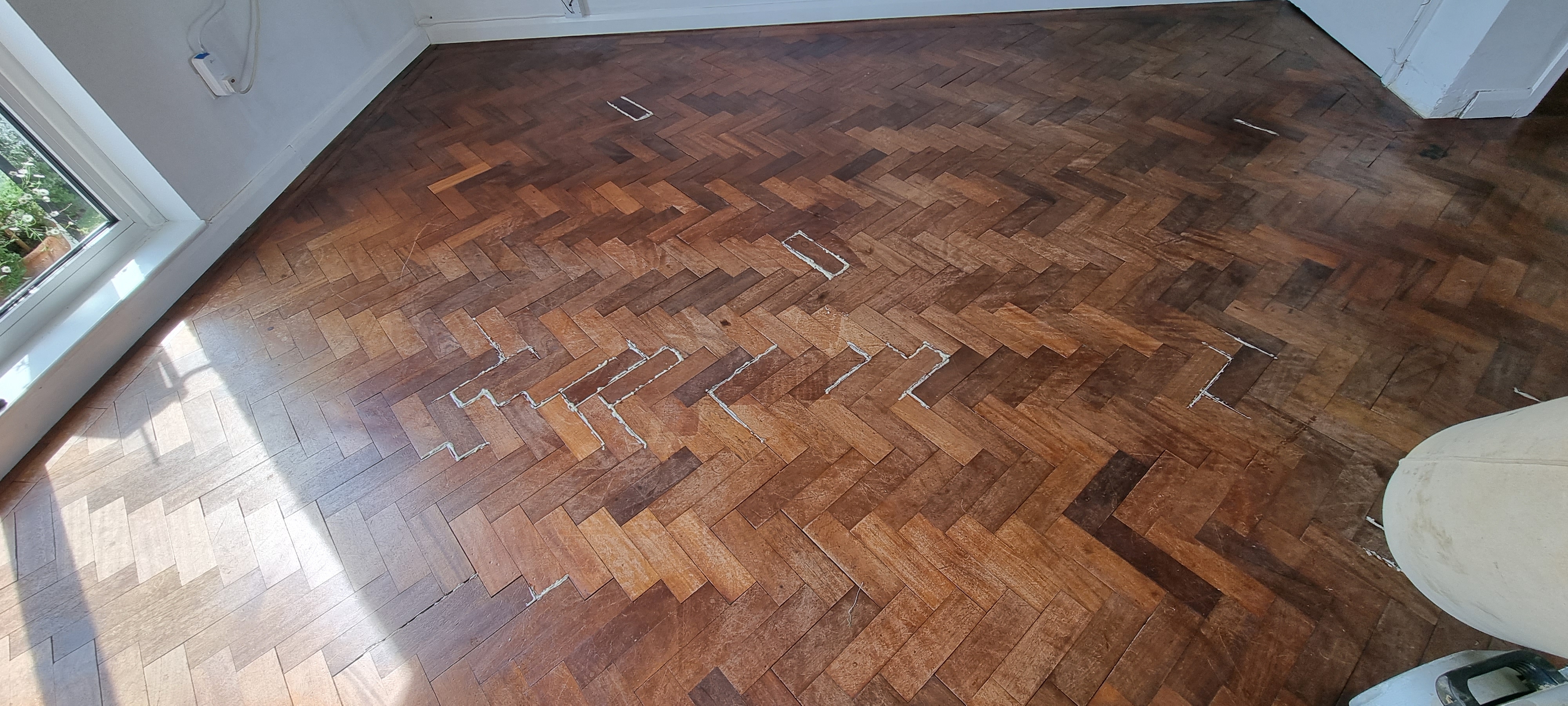 Parquet floor after sanding work in NW5