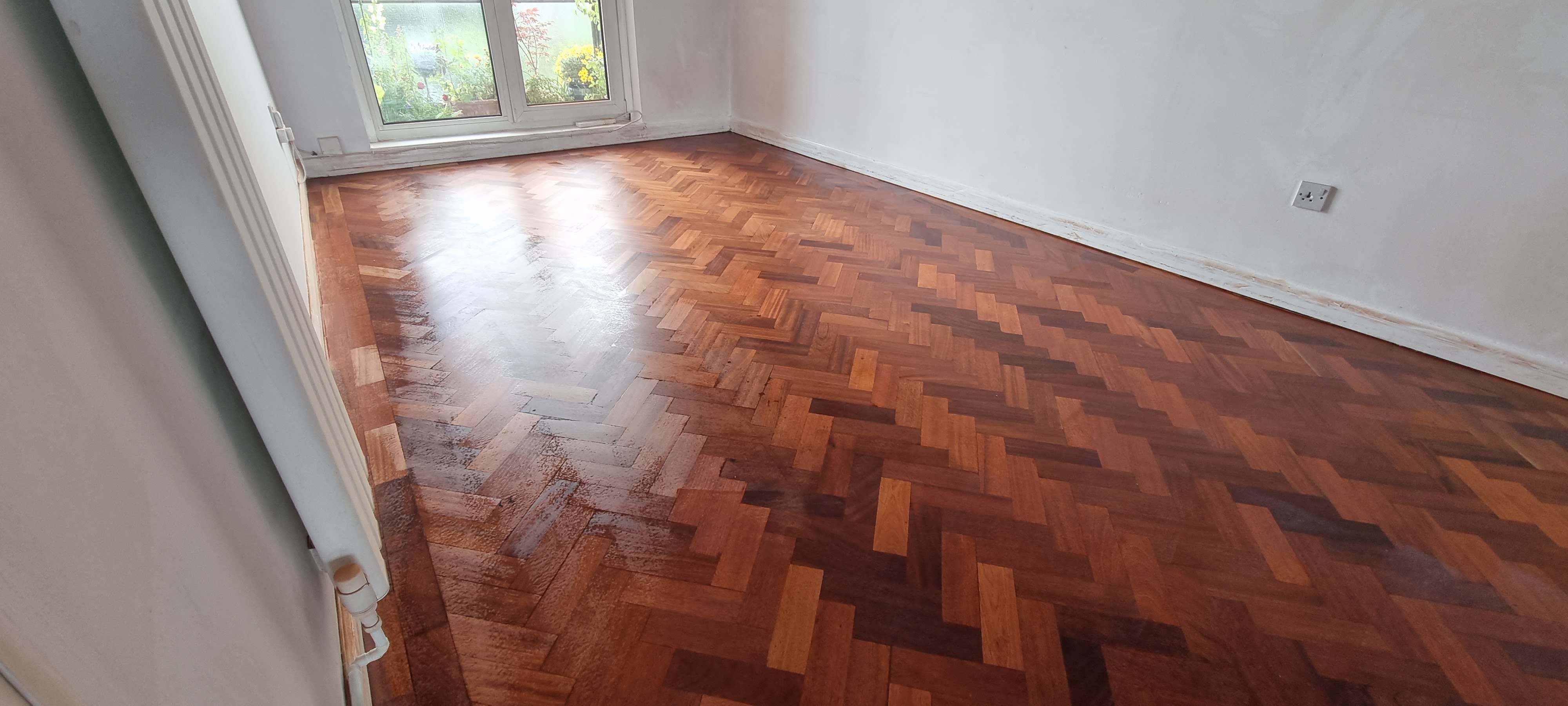 Parquet floor after sanding work in NW5
