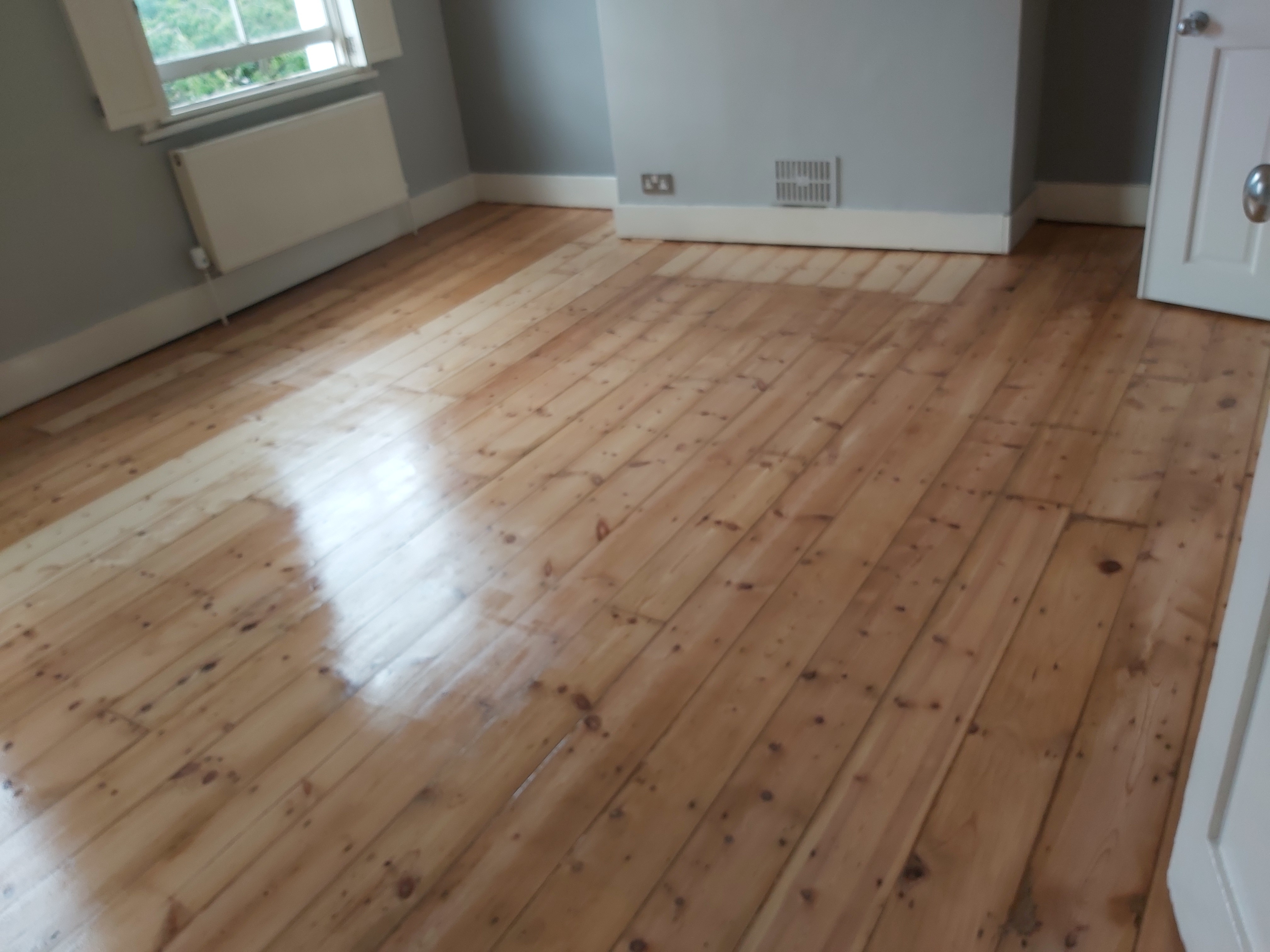 Floorboards floor after sanding work in NW5